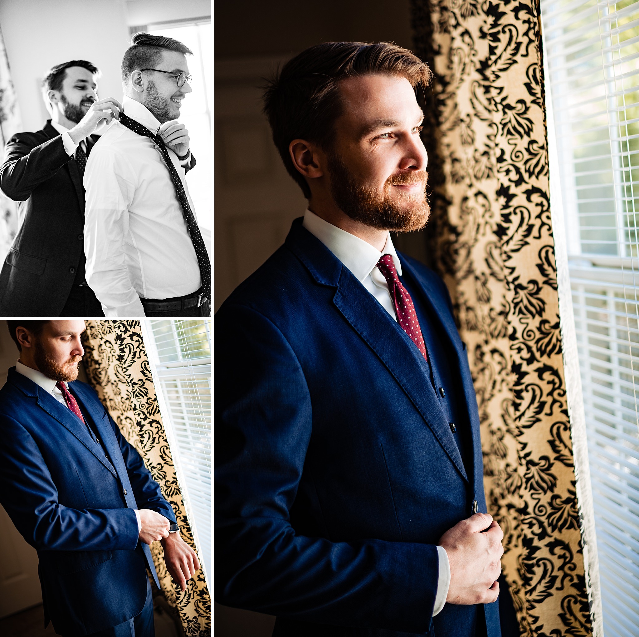 Groom gets ready for his wedding in a navy blue suit with a dark red tie
