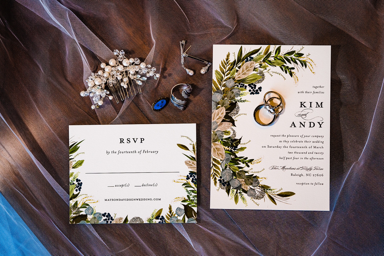 white and green wedding invitations with the bride's wedding jewelry and similar details