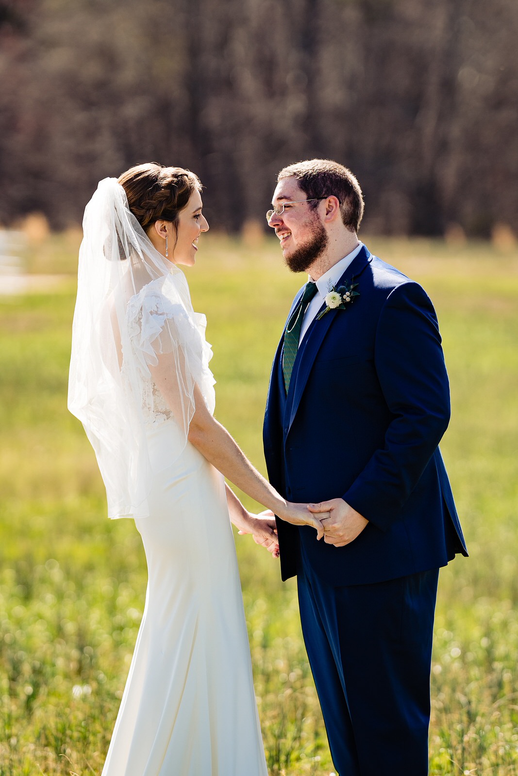 Bride and groom share a first look at The Meadows Raleigh from Raleigh wedding photographers