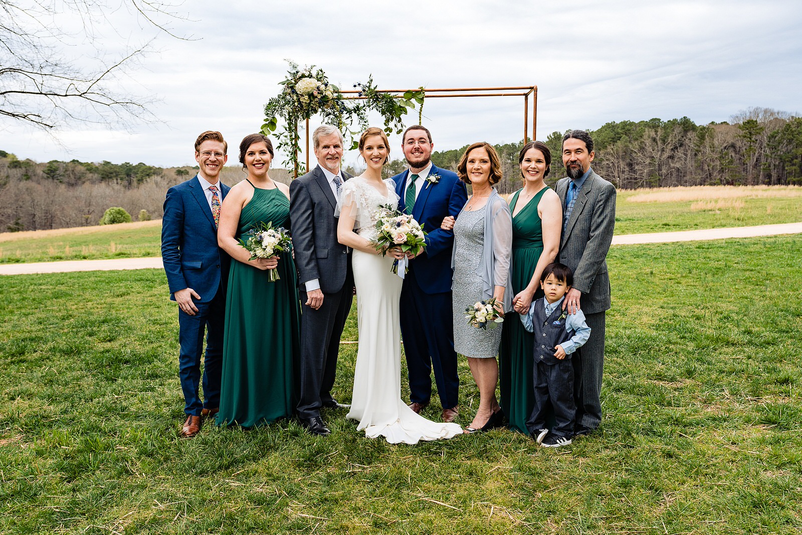 Family portraits on wedding day at The Meadows Raleigh