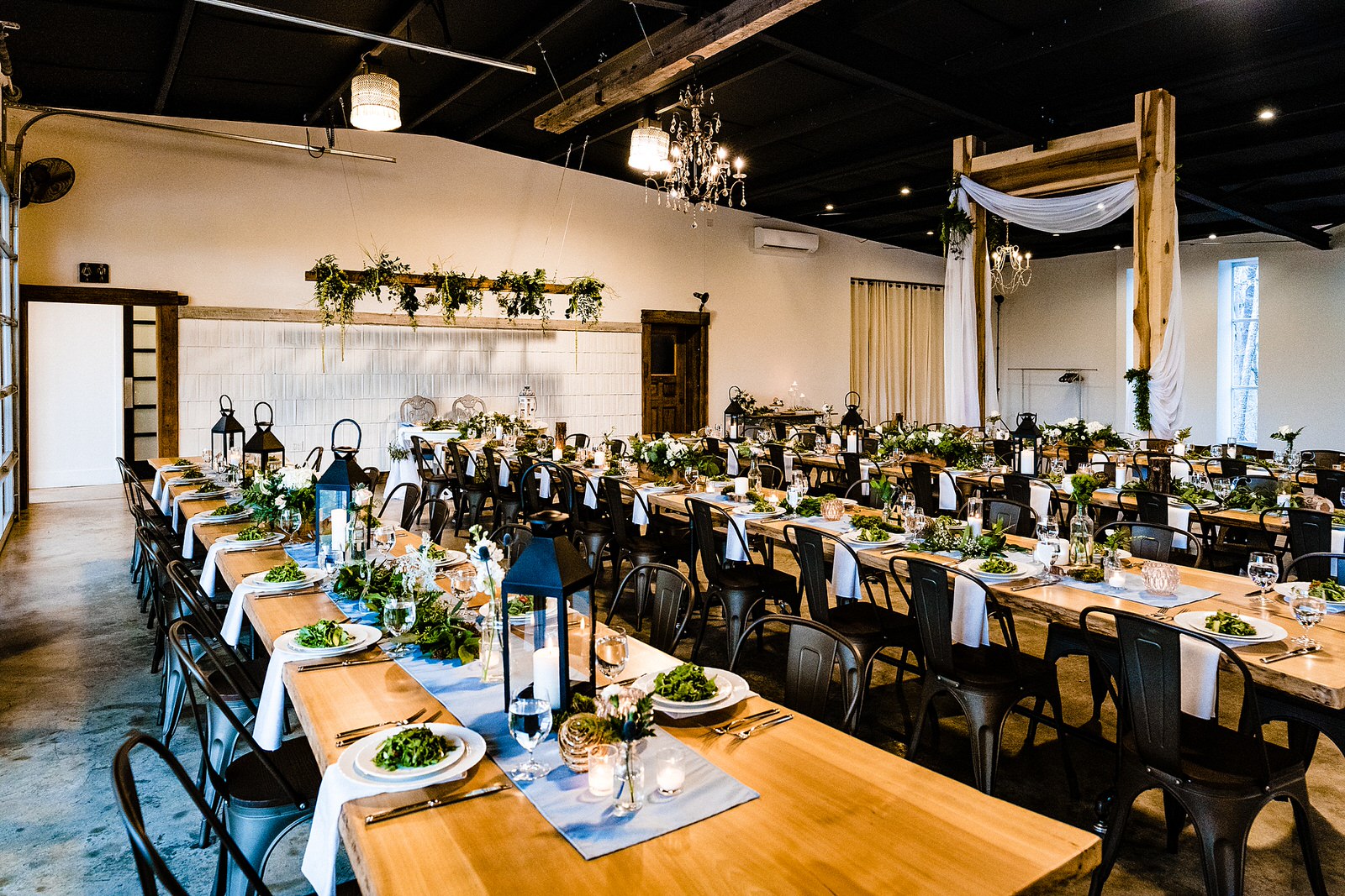 Green and white decor at The Meadows Raleigh wedding reception by Raleigh wedding photographers