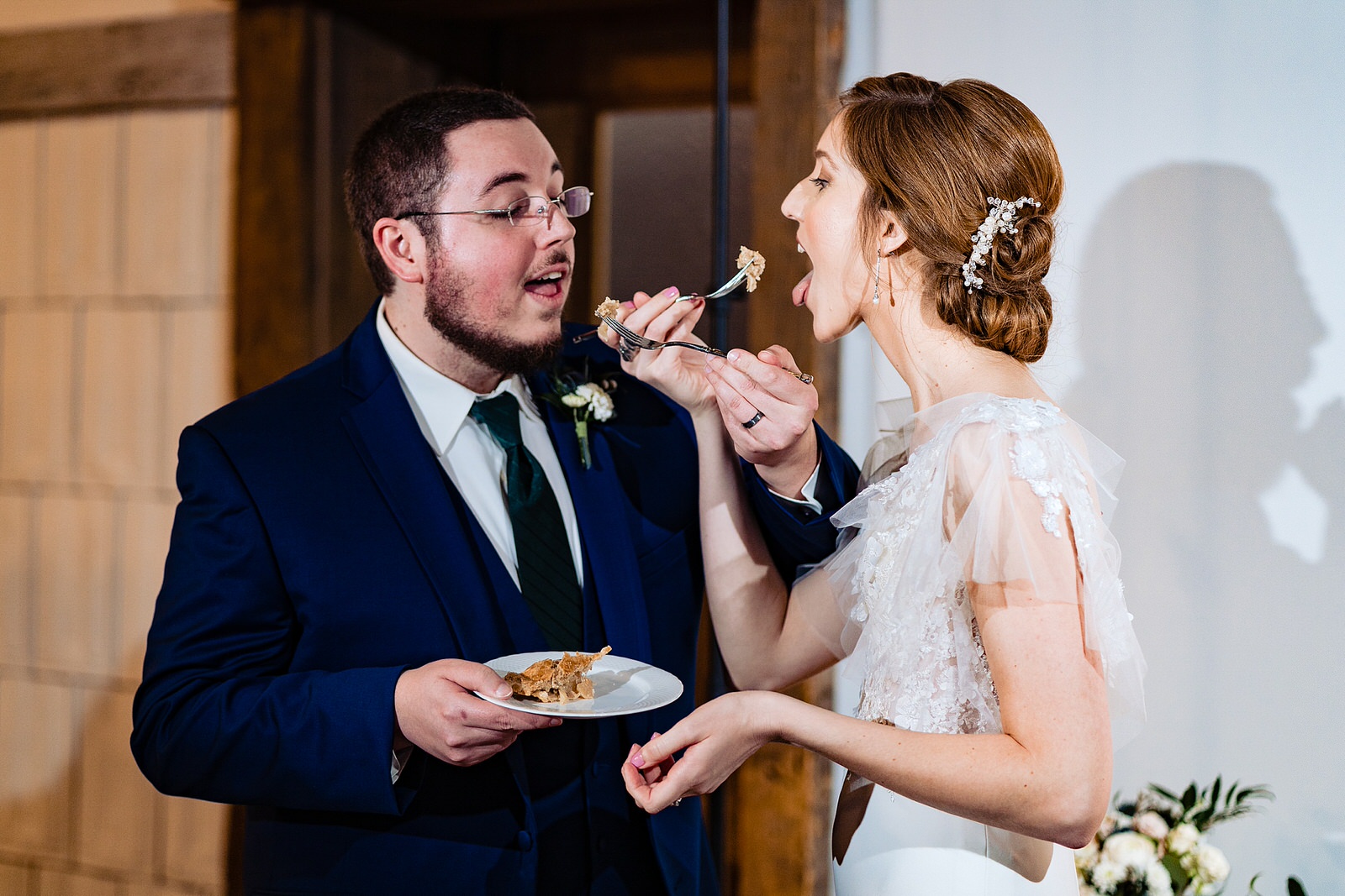 Bride and Groom share the pie at their Pi Day wedding at The Meadows Raleigh