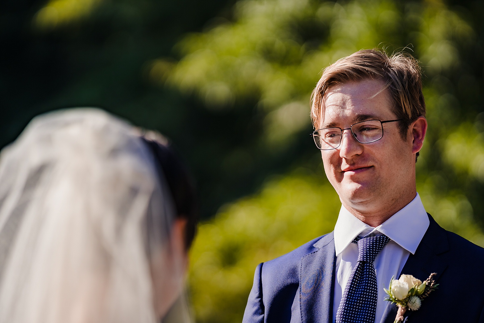 groom looks at bride during chapel hill elopement