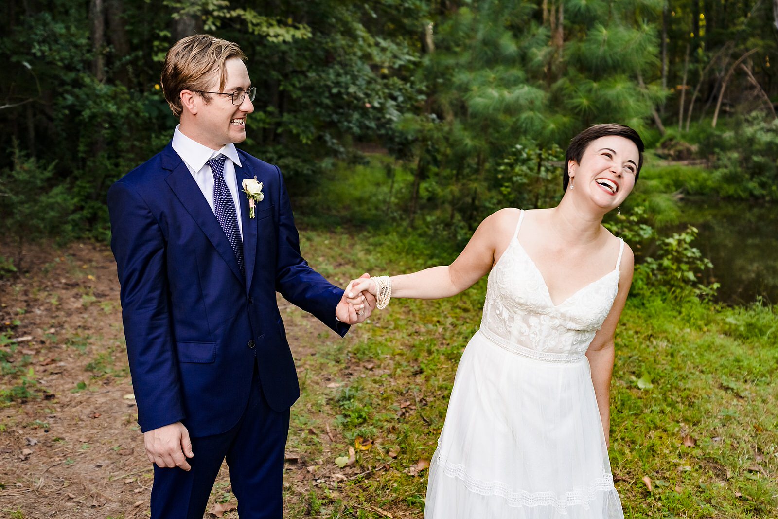 bride and groom laugh during their chapel hill elopement