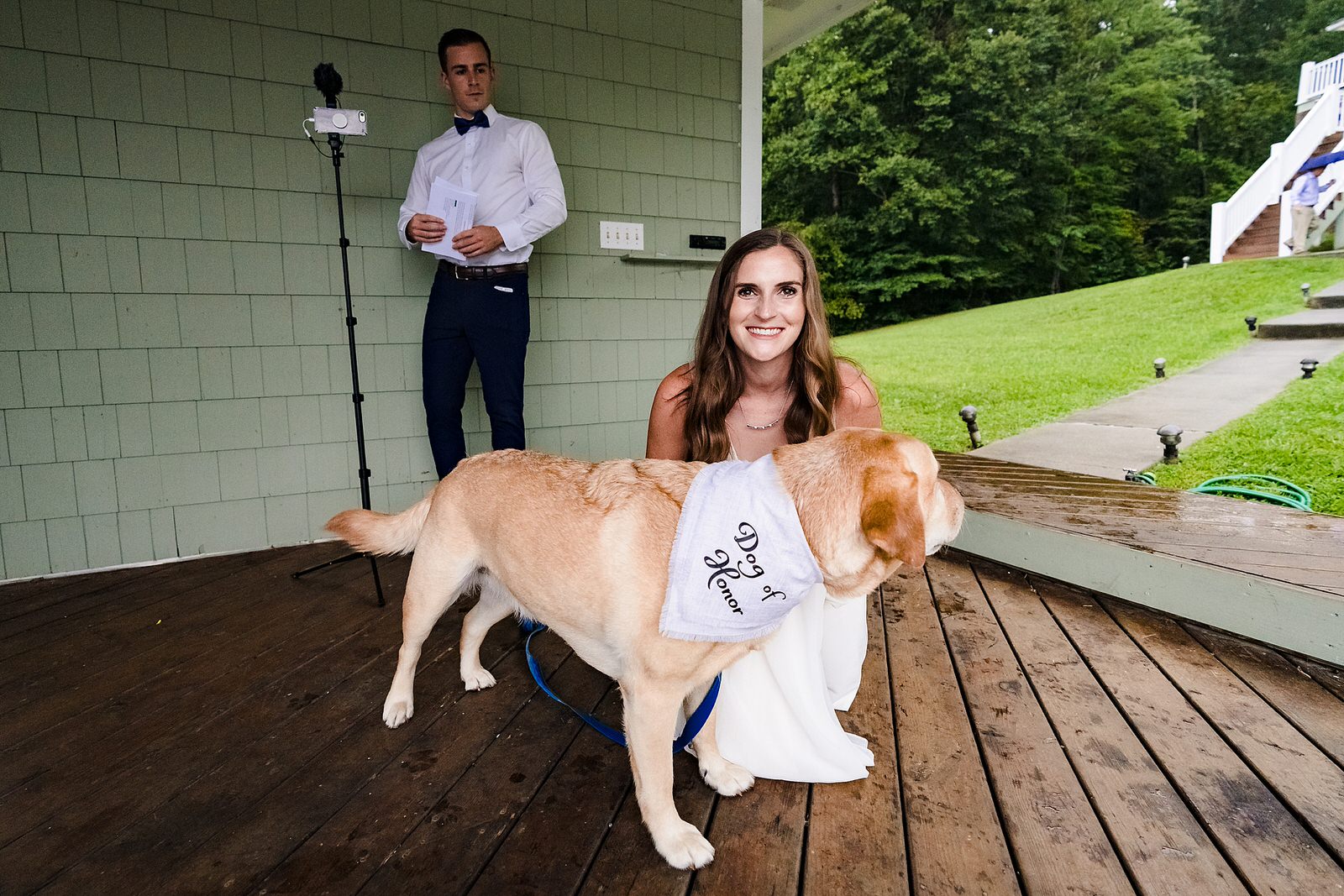 bride poses with dog of honor