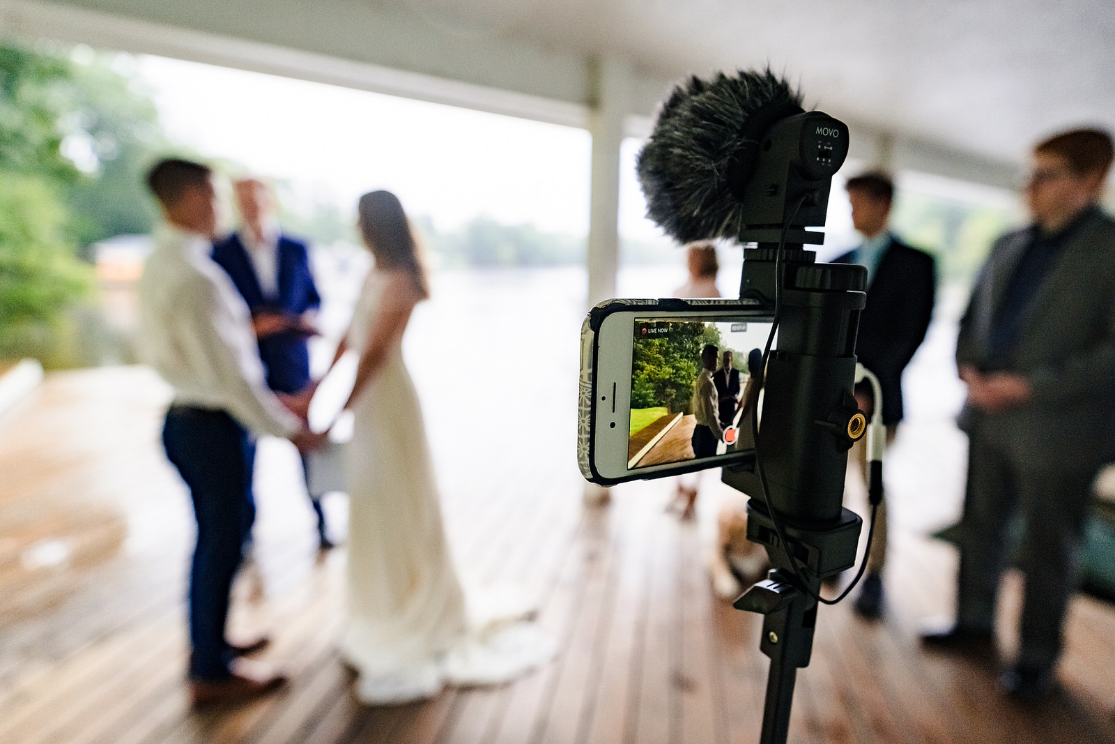 an iphone is set up to livestream a Covid19 microwedding 