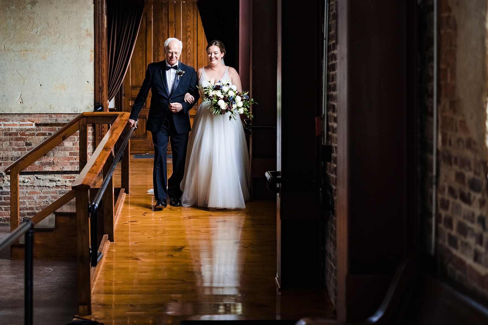 sweet moment as bride and her father walk down the aisle