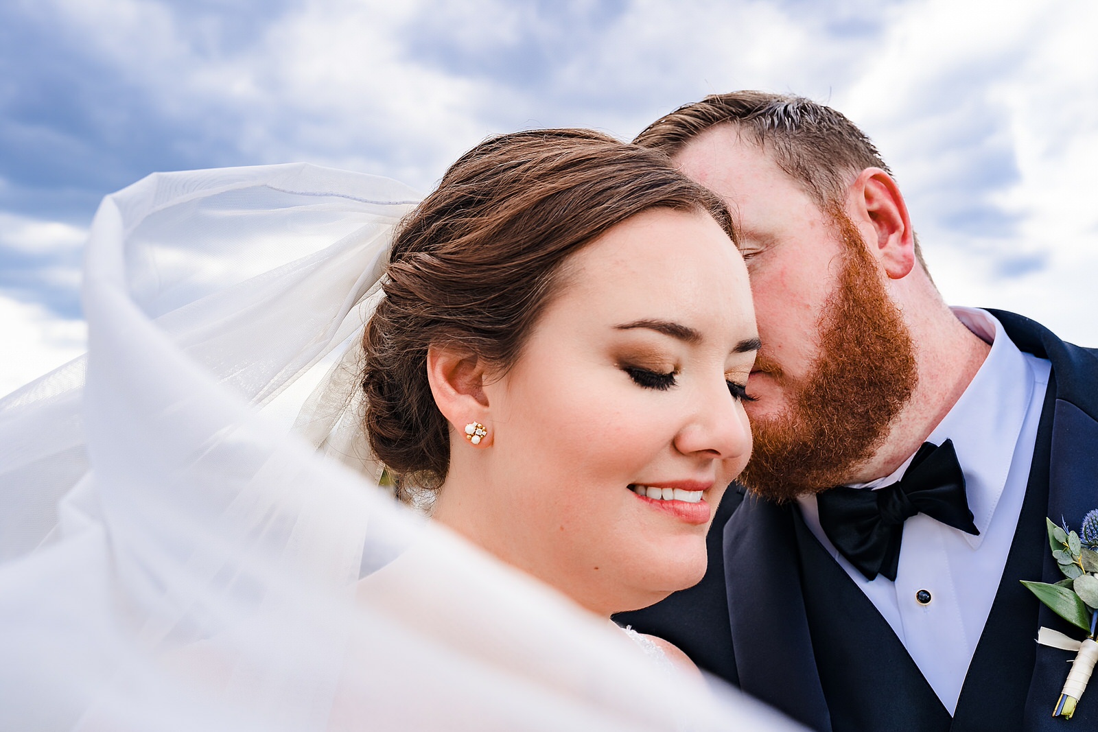 Portrait of a bride and groom on their wedding day at the Brooklyn Arts Center in Wilmington, NC