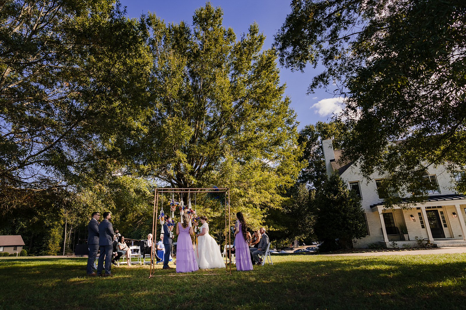 Outdoor wedding ceremony at the Meadows Raleigh