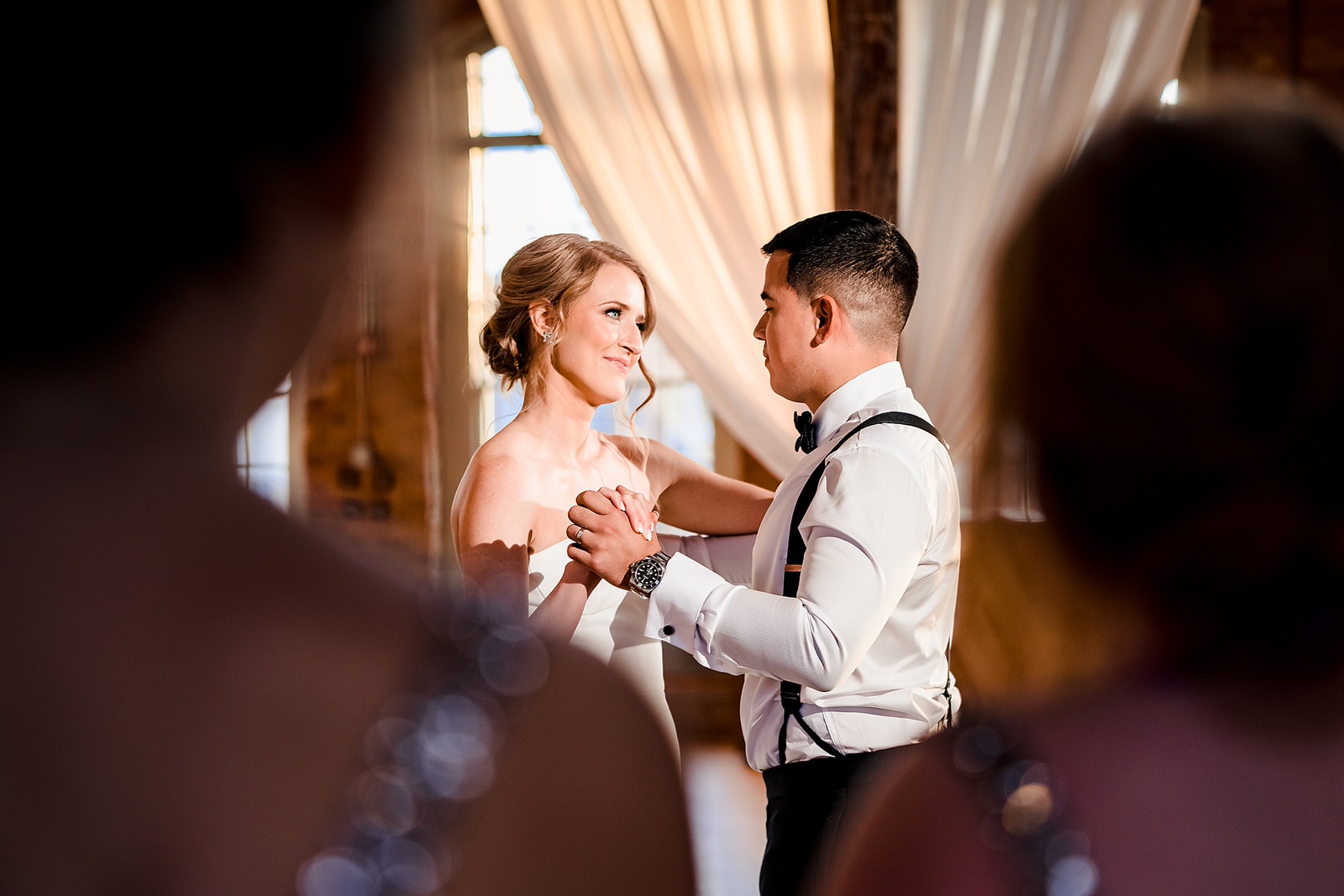 Couple shares their first dance at The Cotton Room in Durham, NC