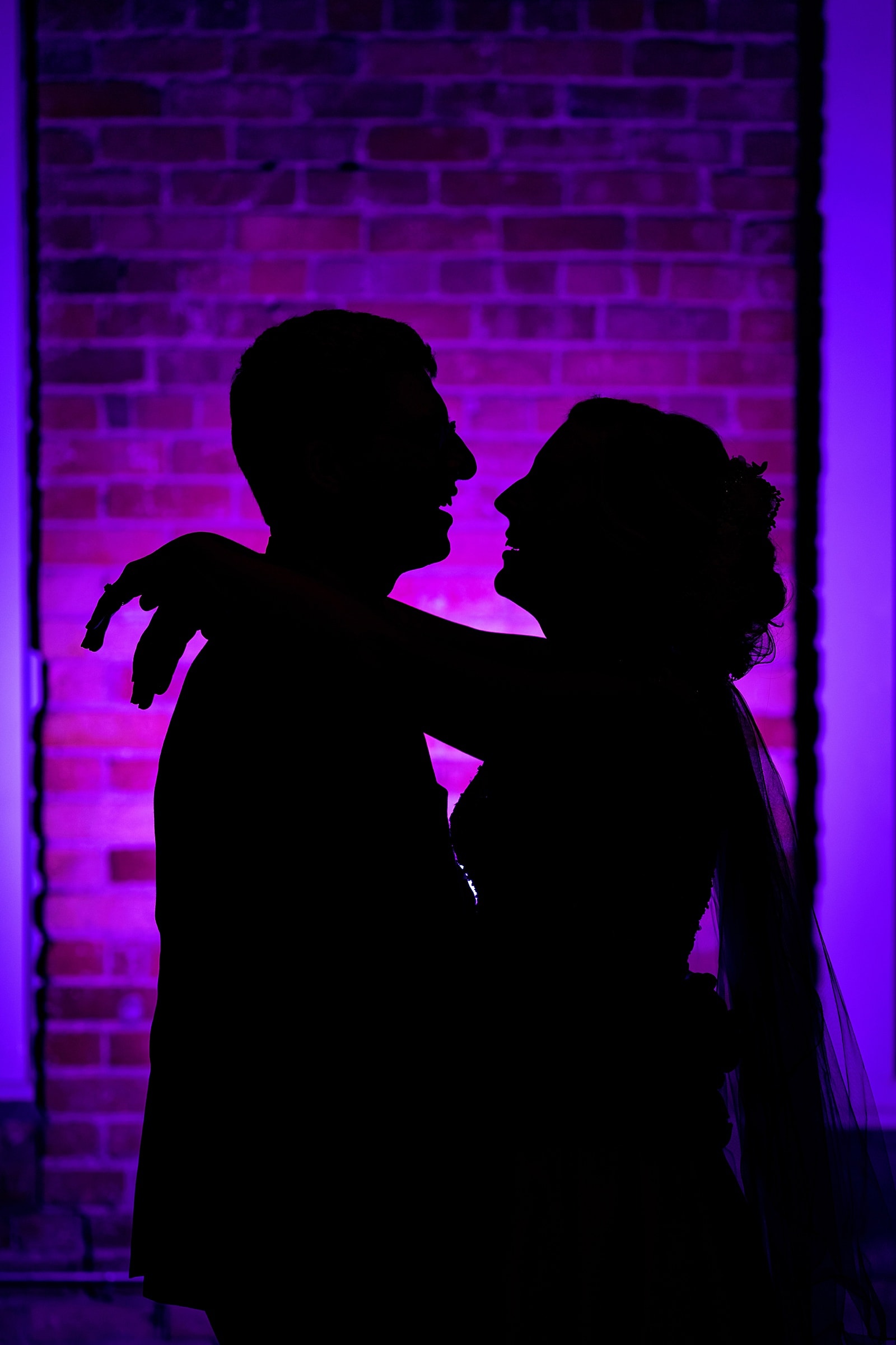 A silhouette with your wedding colors is a perfect nighttime portrait