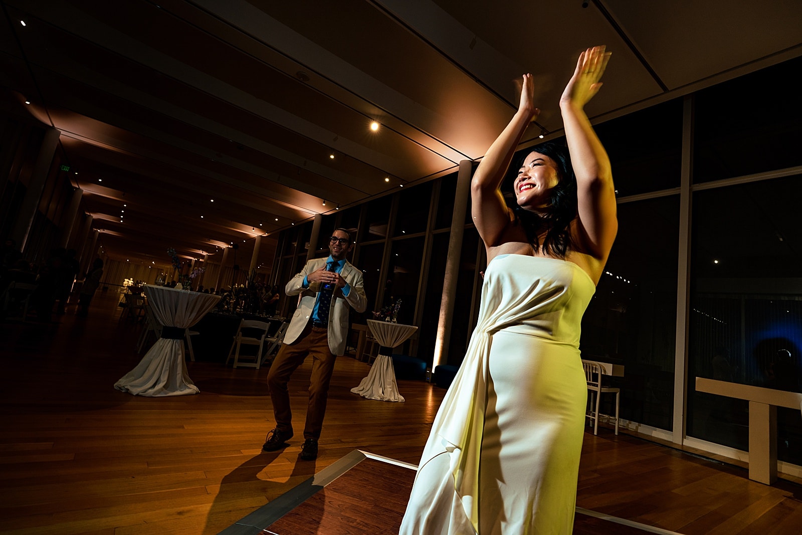 the most surefire way to get wedding guests on the dance floor is for the couple to be dancing!