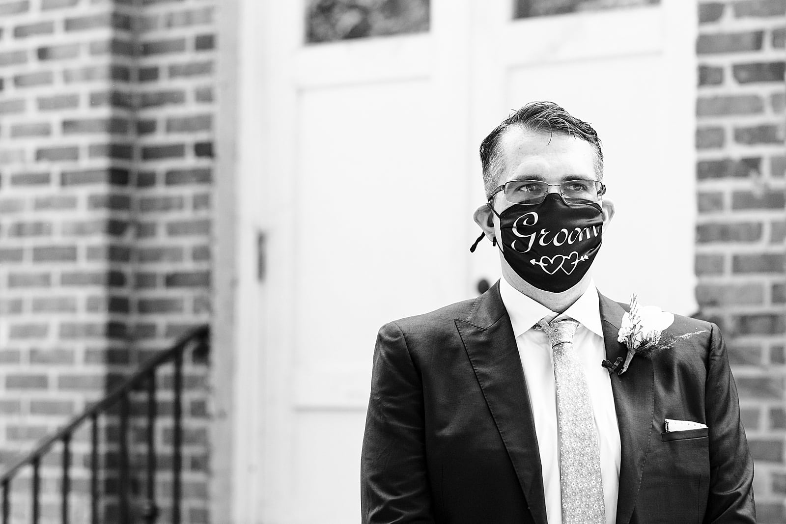 bride and groom wear custom masks on their wedding day during the COVID pandemic