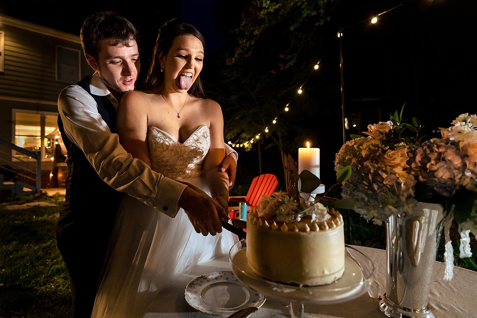 If you're having an al fresco wedding reception, make sure you get a photographer who knows how to light up the dark