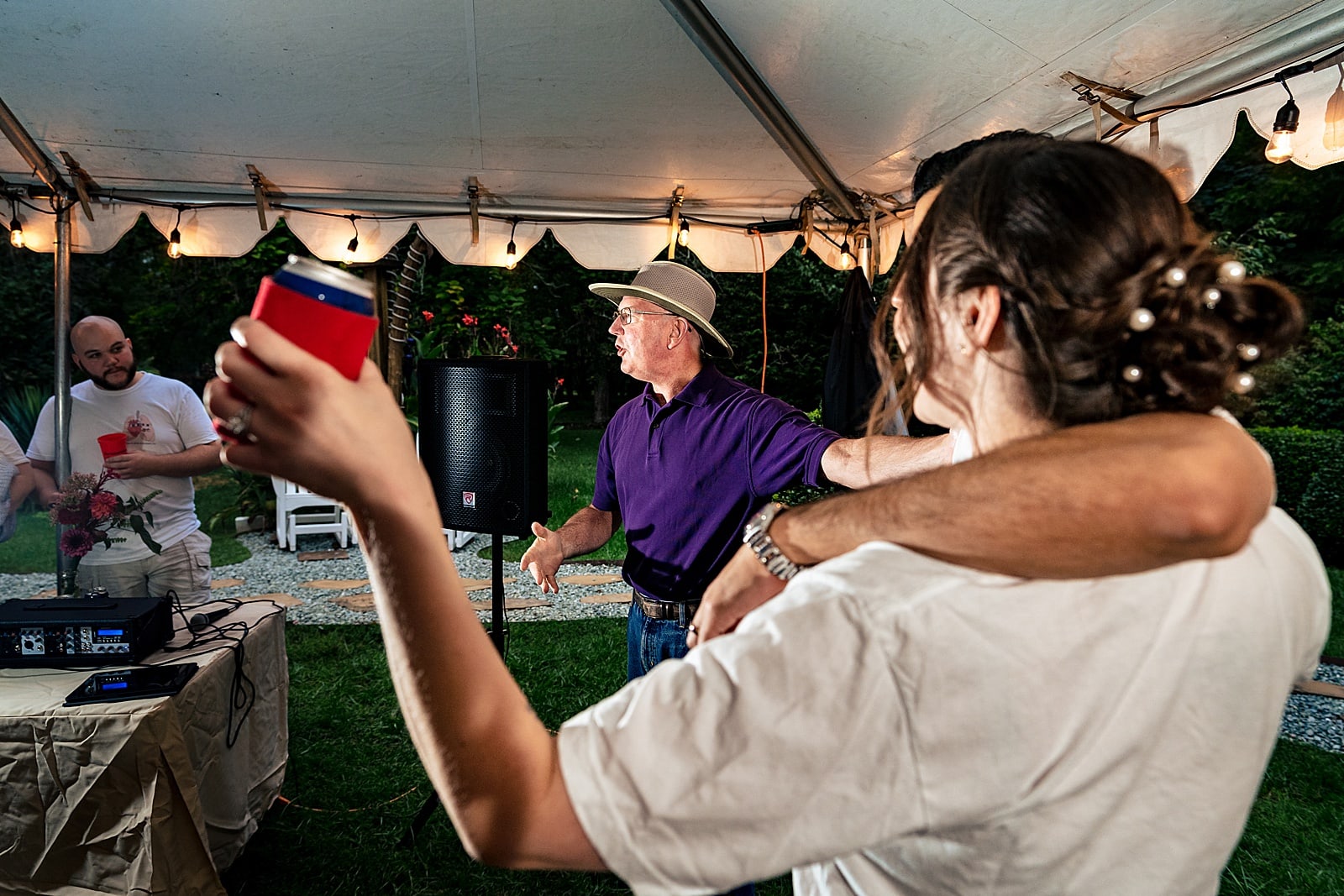 father of the bride toast at a casual outdoor wedding