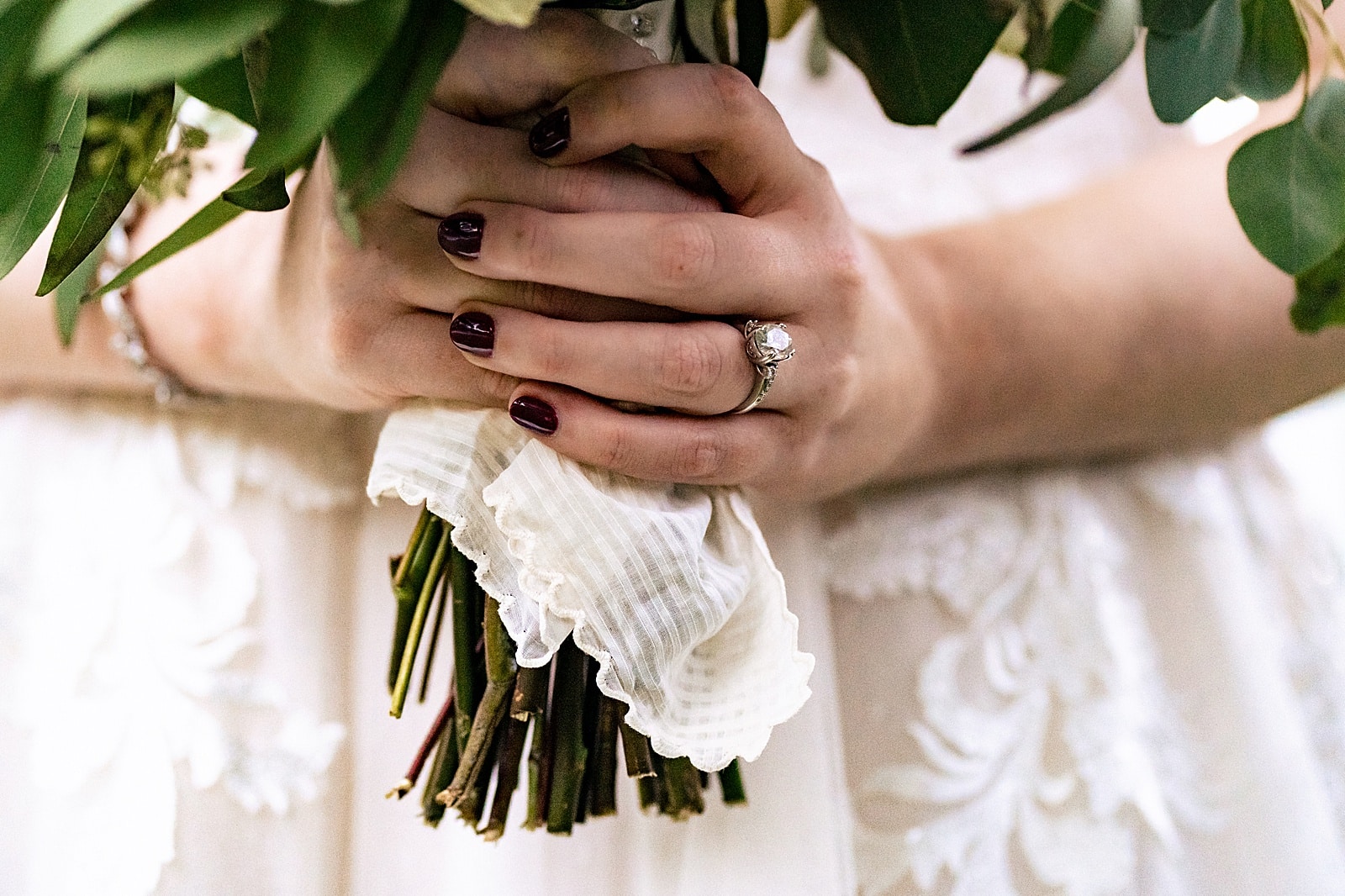 this bride had her grandmother's handkerchief wrapped around her bouquet