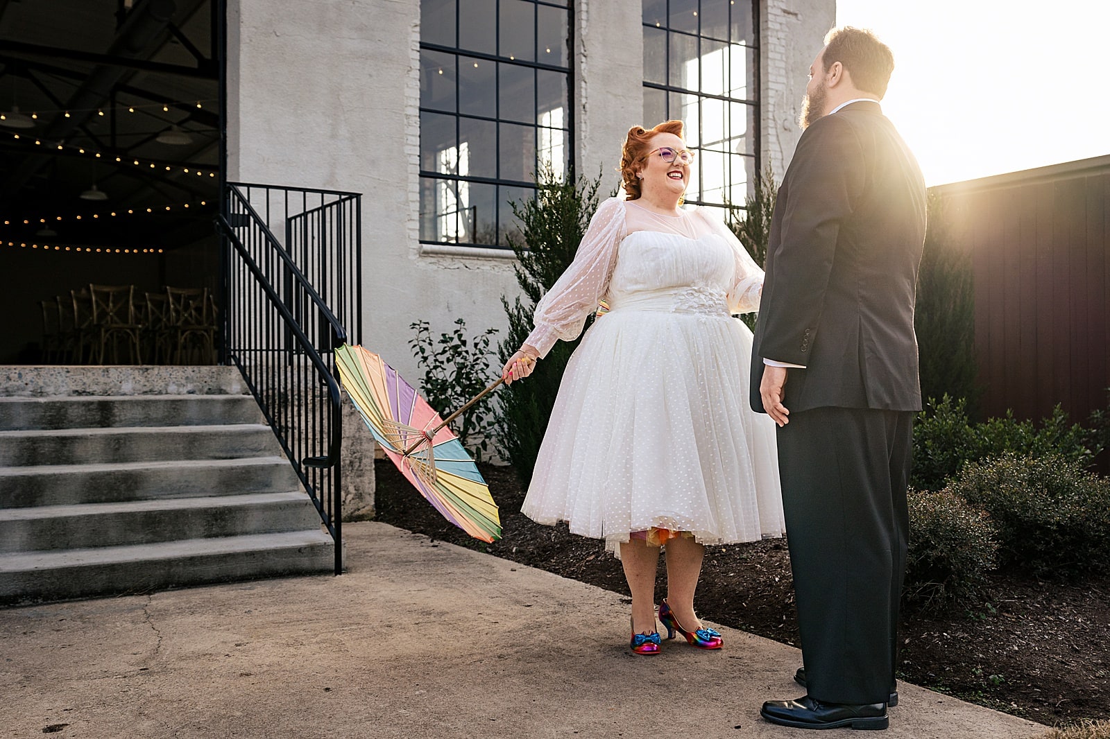 This bride had a rainbow petticoat and a rainbow parasol and a rainbow veil and she's just the best - awesome nerdy Graham Mill wedding