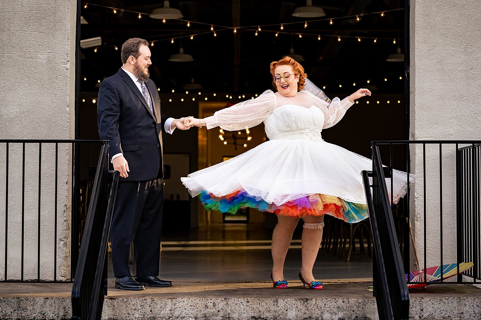 This bride had a rainbow petticoat and a rainbow parasol and a rainbow veil and she's just the best - awesome nerdy Graham Mill wedding