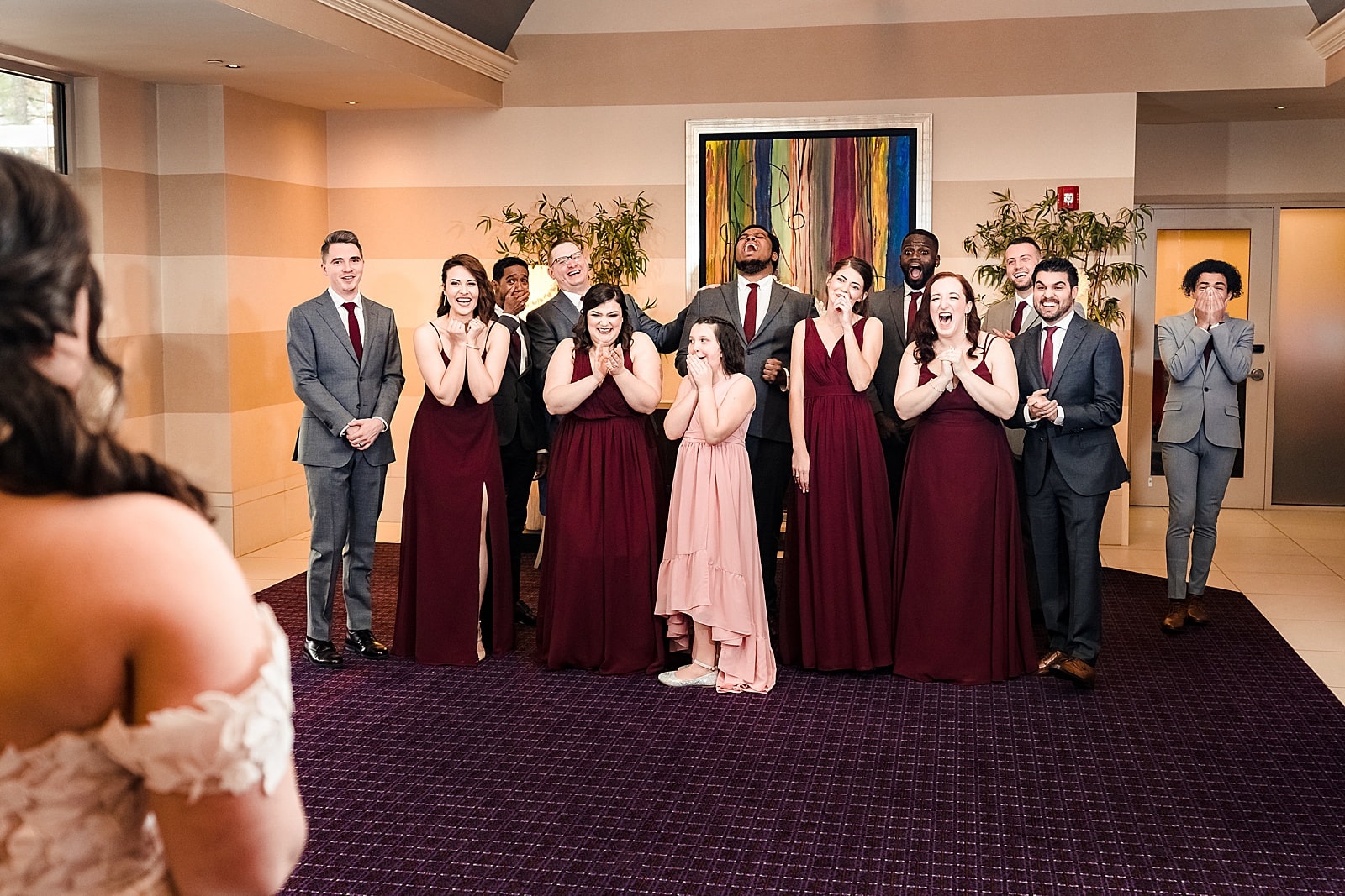 This bride did a first look with the wedding party and their reactions were priceless