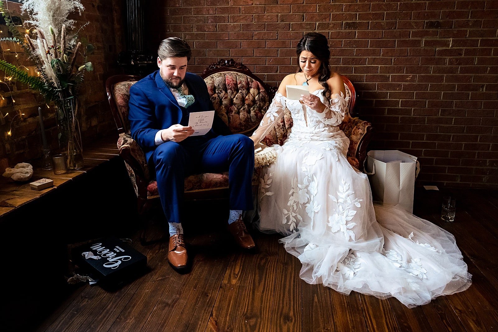Couple exchanges letters and gifts before their wedding ceremony at Brick & Mortar Events in Clayton, NC