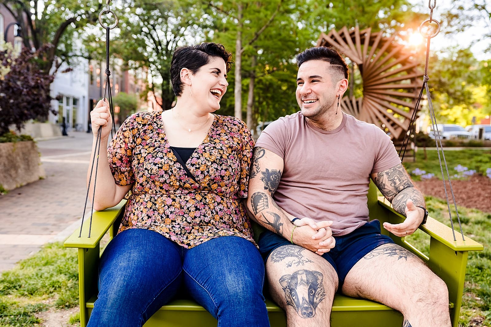 Engaged couple enjoys a porch swing in downtown Durham