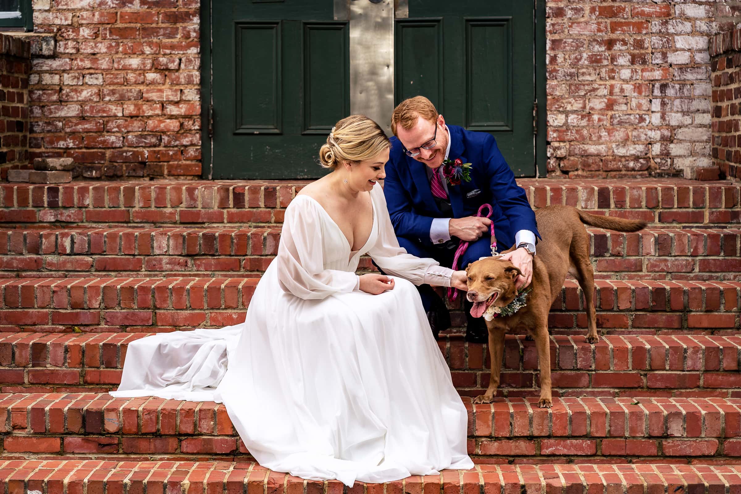 Bride & groom with their dog in downtown Raleigh | photos by Kivus & Camera