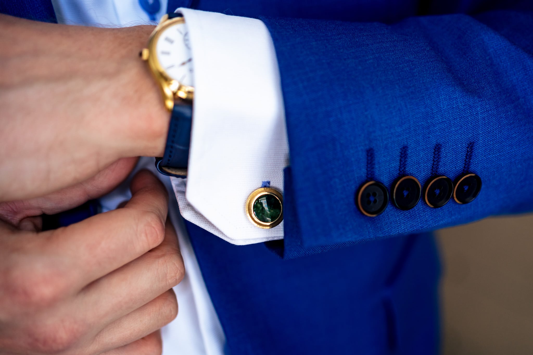 closeup of groom's watch and cufflinks | photo by Kivus & Camera