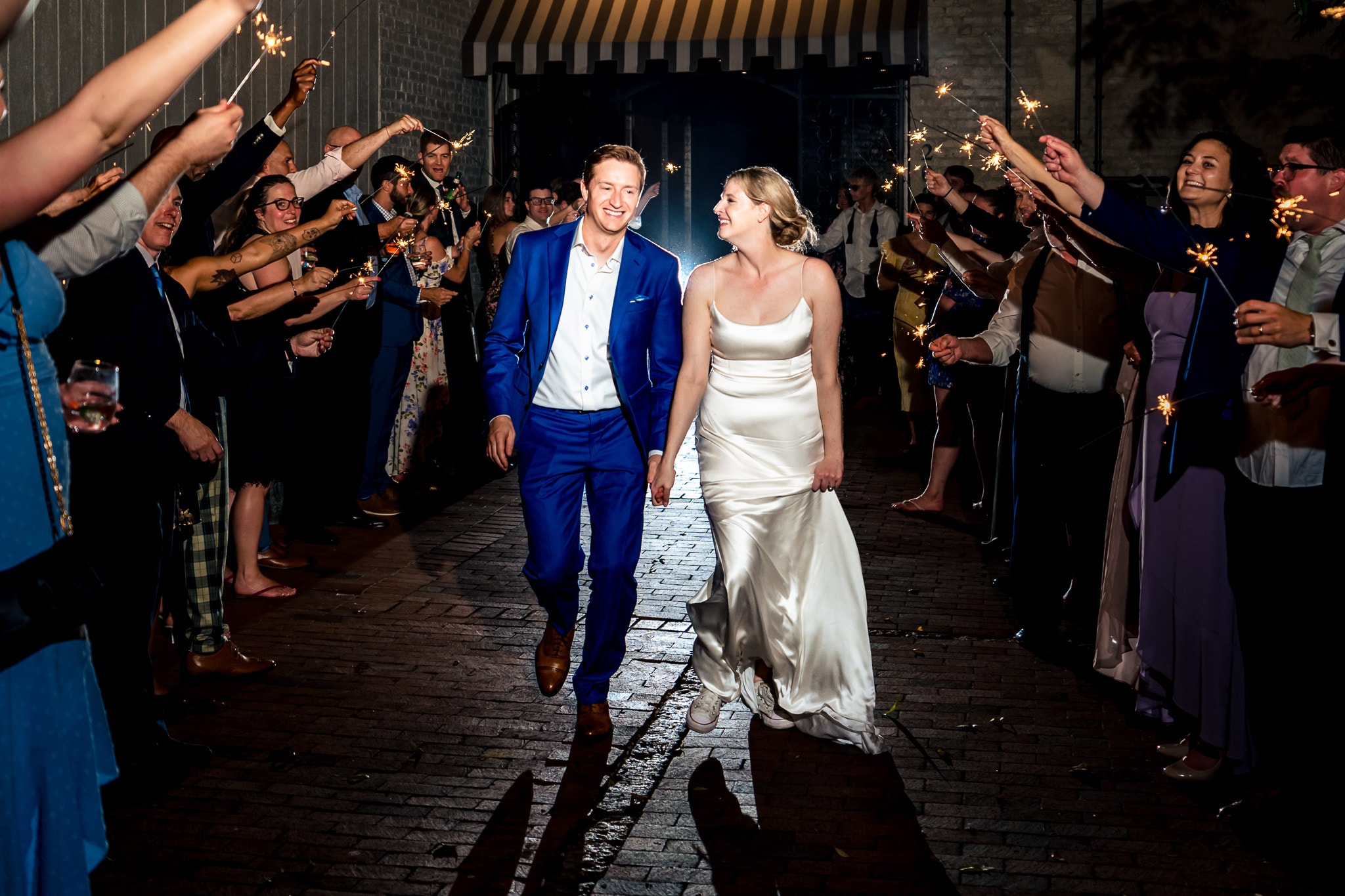 wedding day sparkler exit at The Grove at City Market | photo by Kivus & Camera