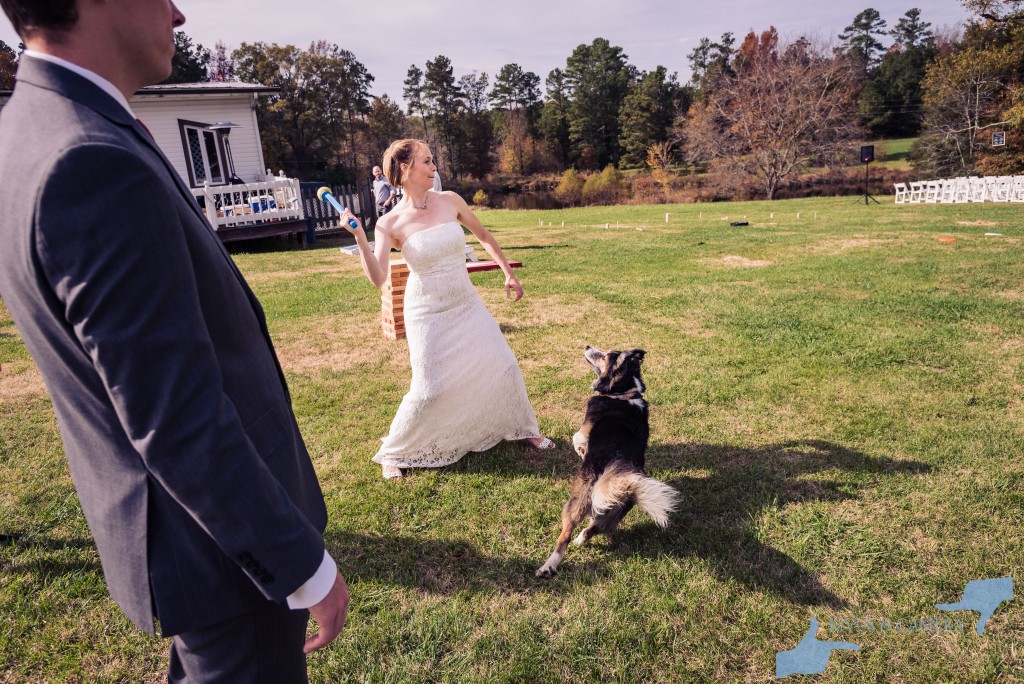 Bride playing fetch with dog