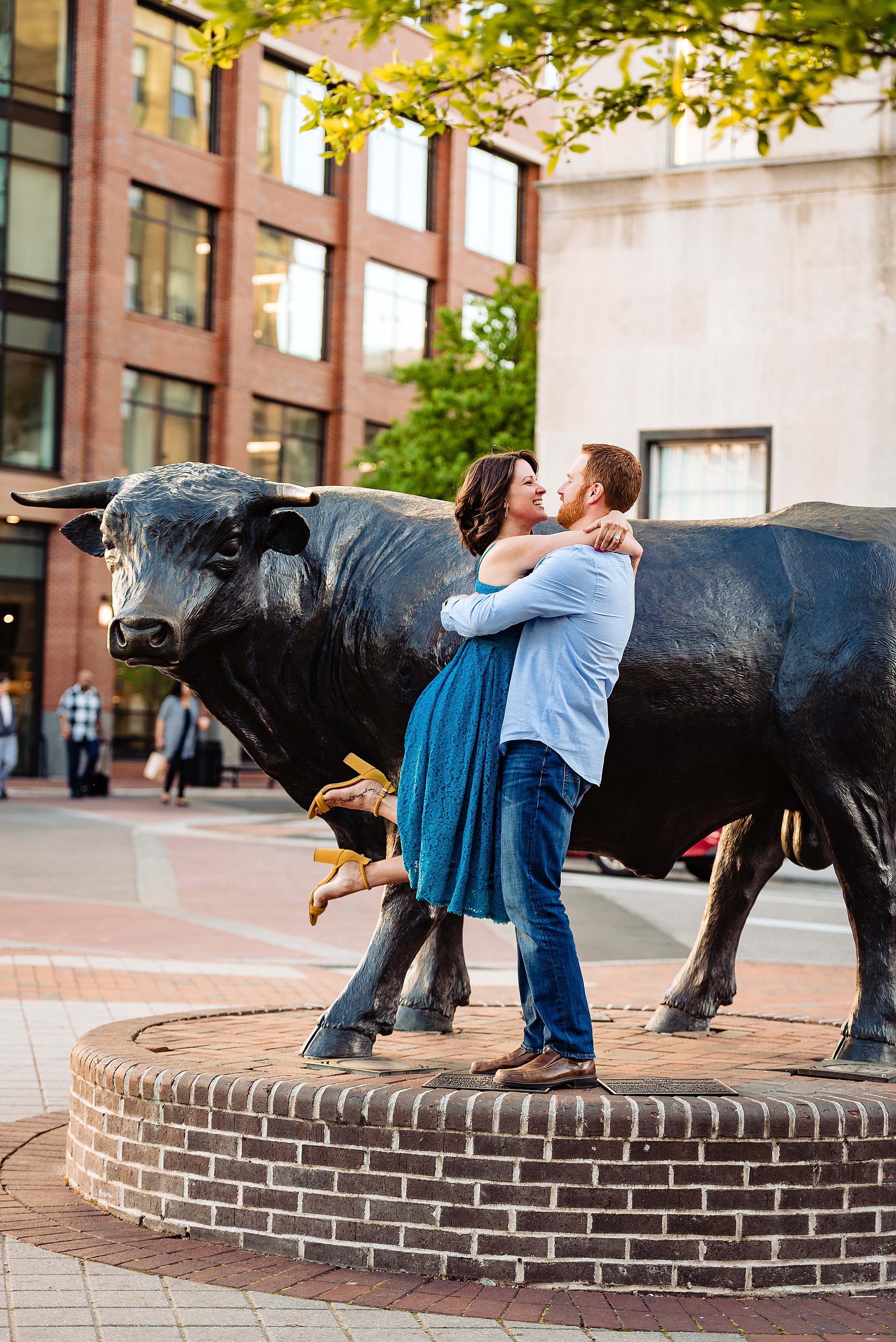 Downtown Durham Engagement photos with Major the Bull
