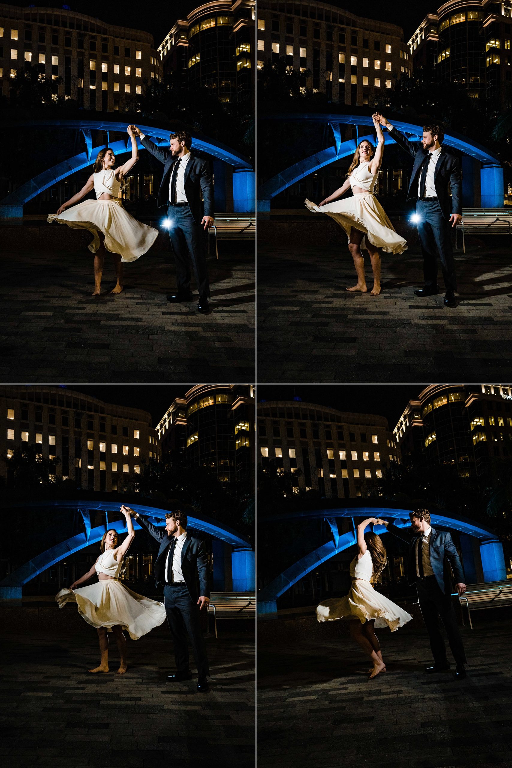 Bride and groom dance in the dark in front of a blue sculpture in Oralndo, FL | kivusandcamera.com