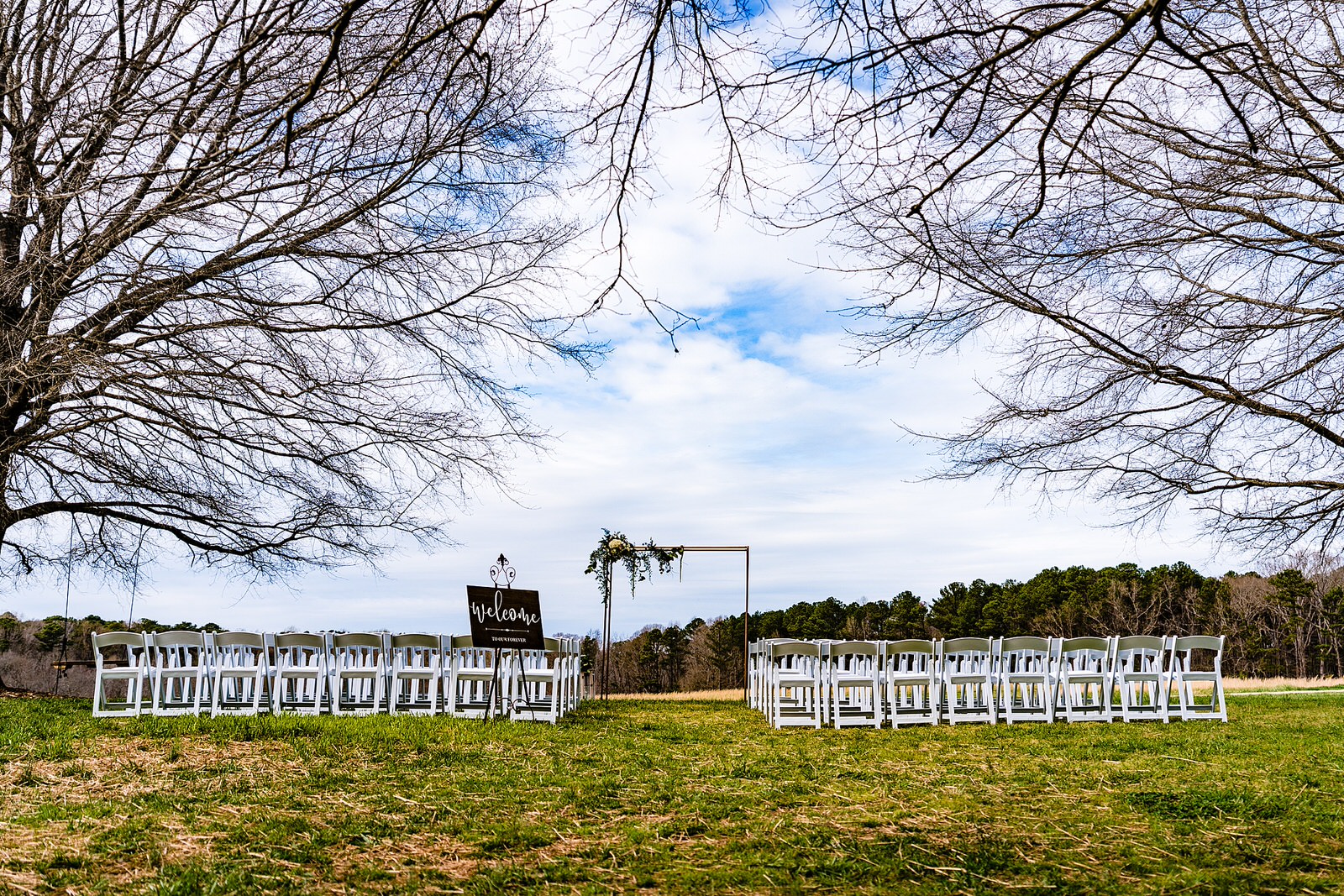 Outdoor Raleigh wedding ceremony at The Meadows at Firefly Farm