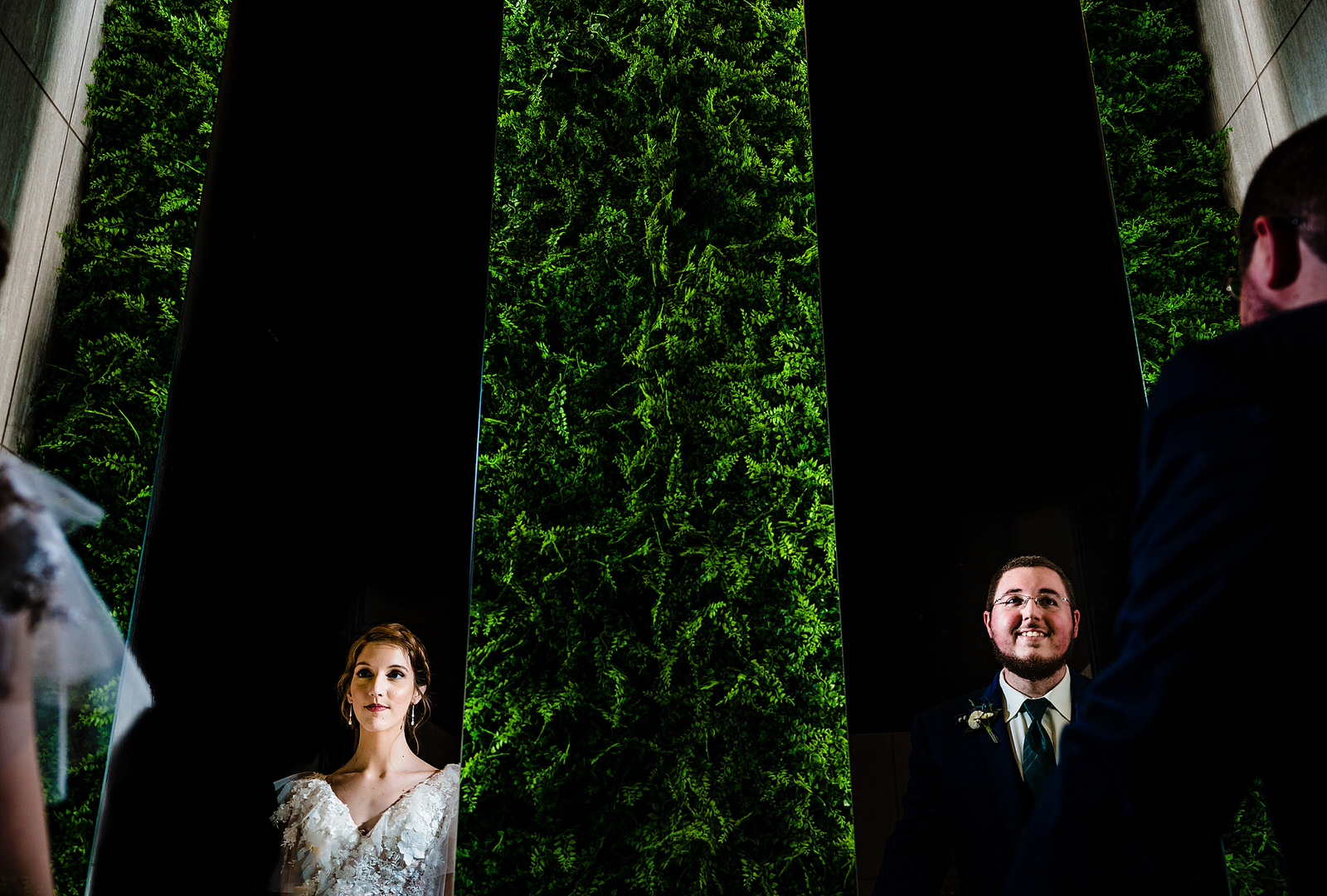 Bride and groom pose for a dramatic portrait on their wedding day at The Meadows Raleigh