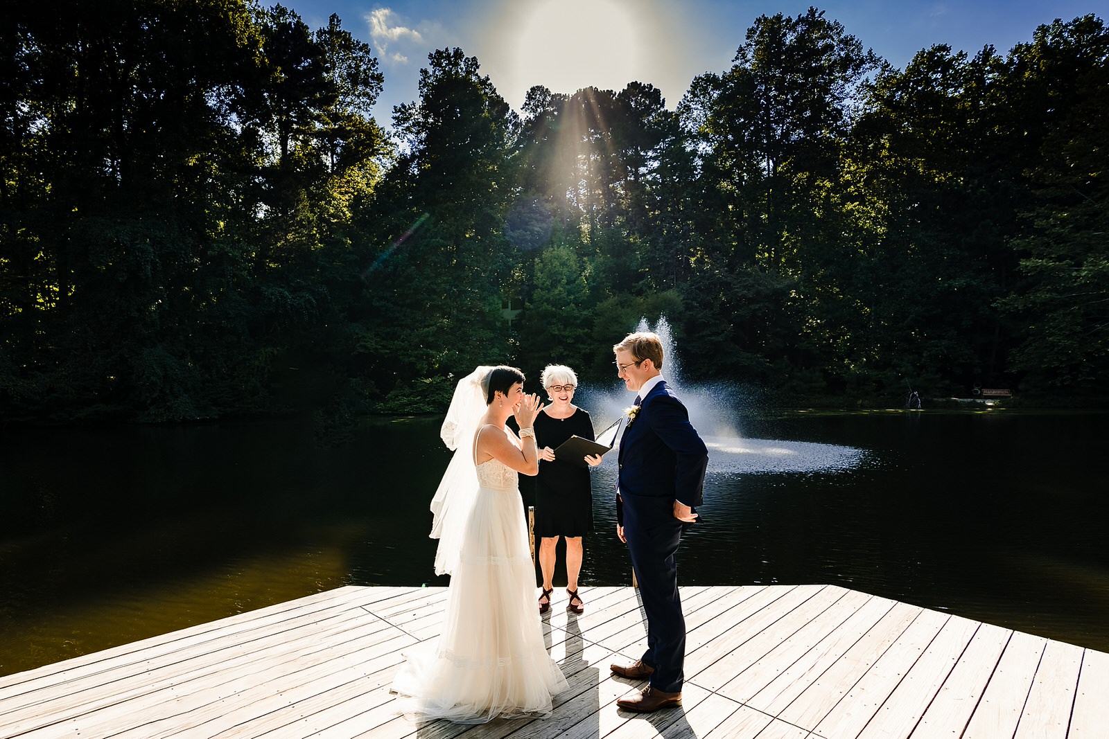 wedding couple and officiant Laney Margolis engaged in Chapel Hill elopement wedding ceremony