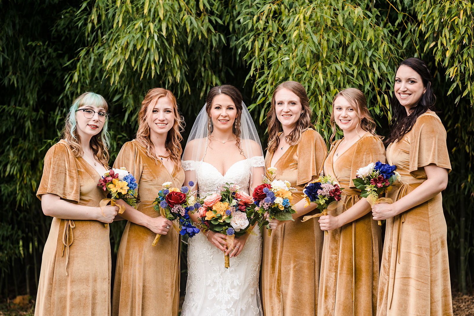 Bridesmaid style: dark yellow velvet wrap dresses