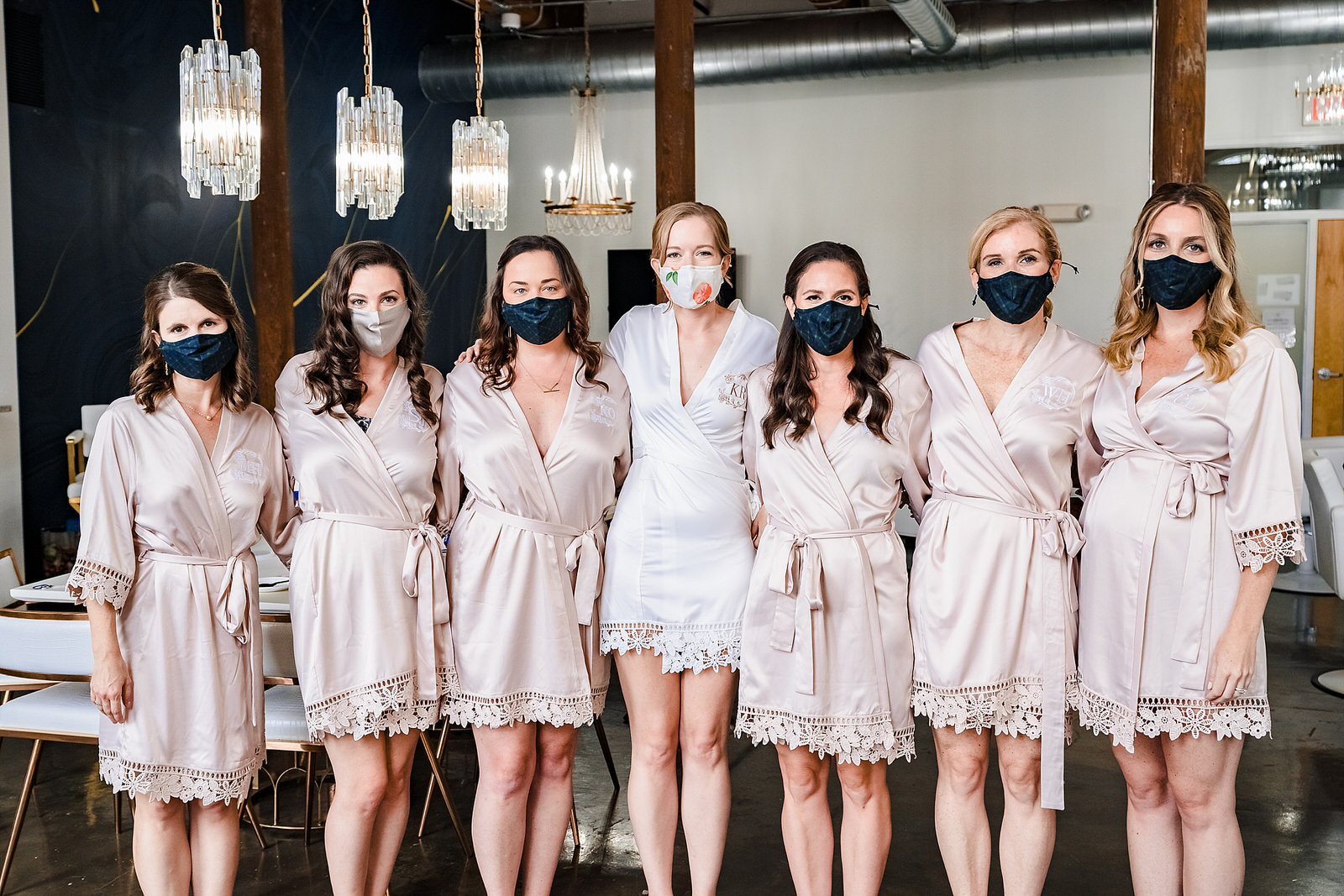 Bride & bridesmaids pose in custom wedding masks during Covid19 wedding