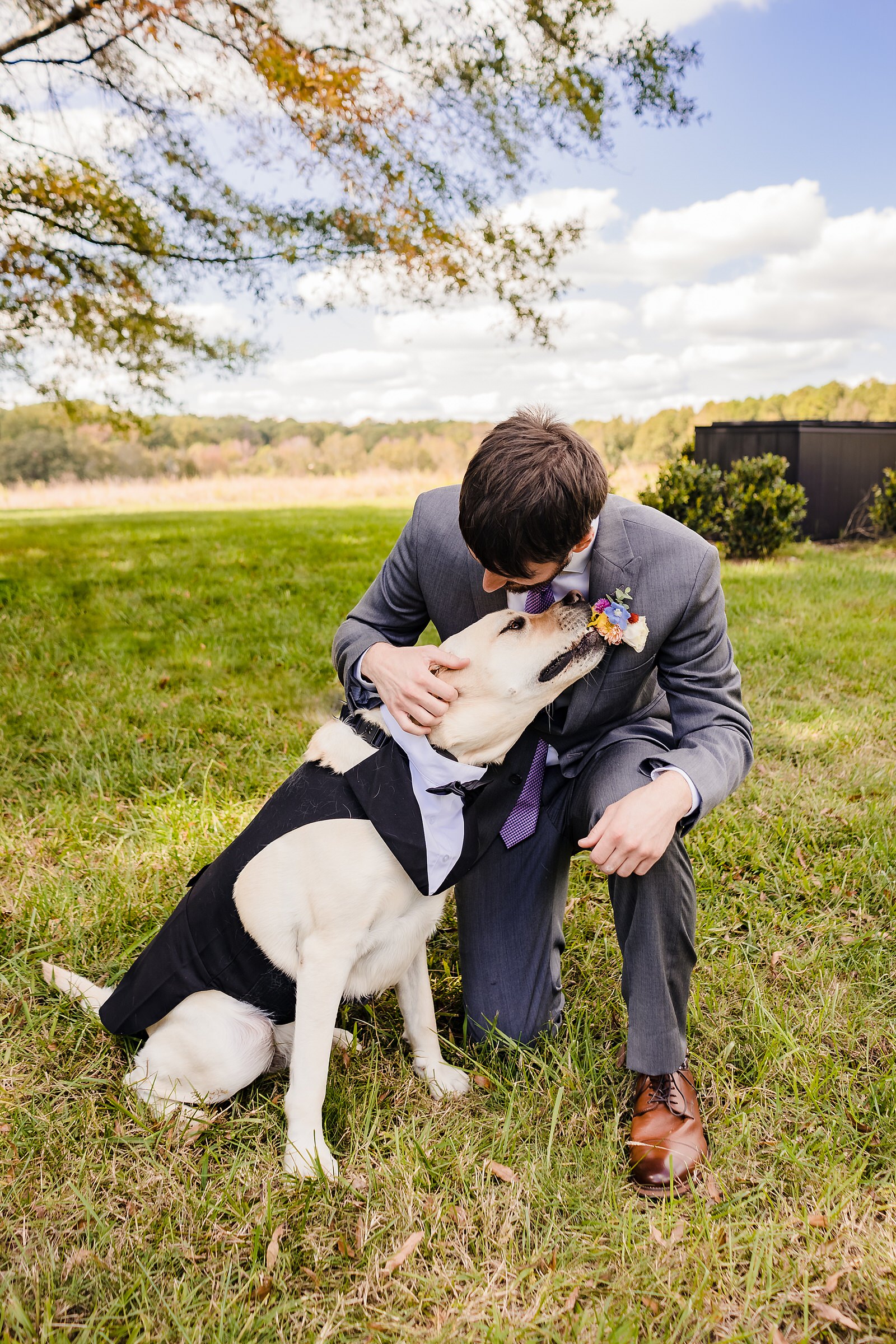 Ring bearer dog tries to eat the groom's boutonniere. 