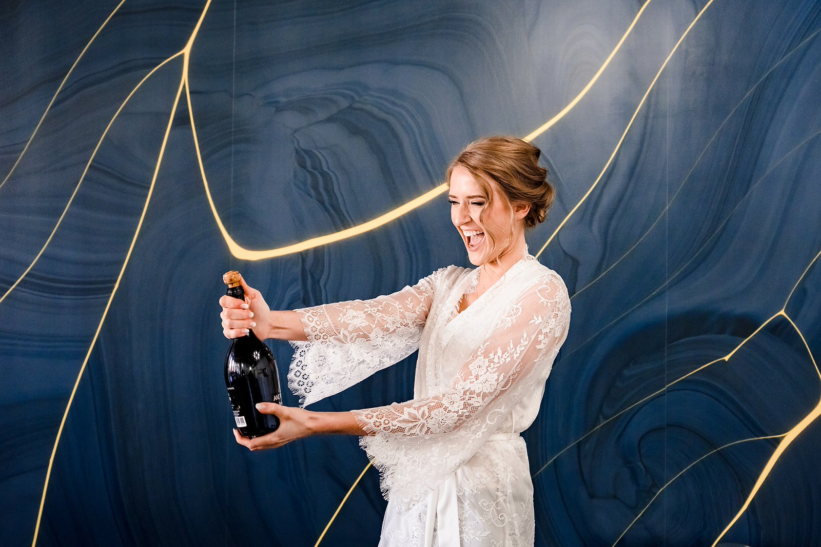 Make sure you pop your champagne before you put your wedding dress on. (you can pop some more later too!!!)