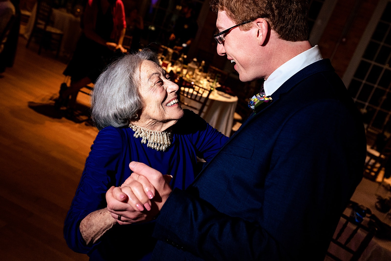 Groom dances with his grandmother at his wedding