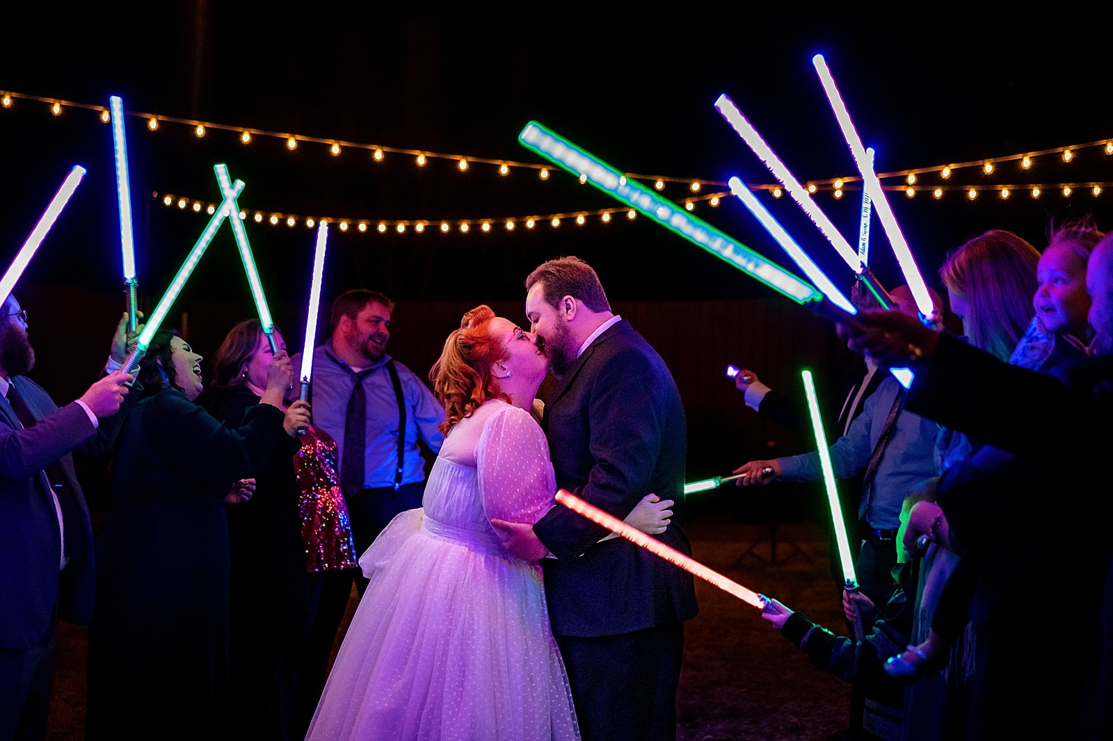 Nerdy wedding with a lightsaber exit