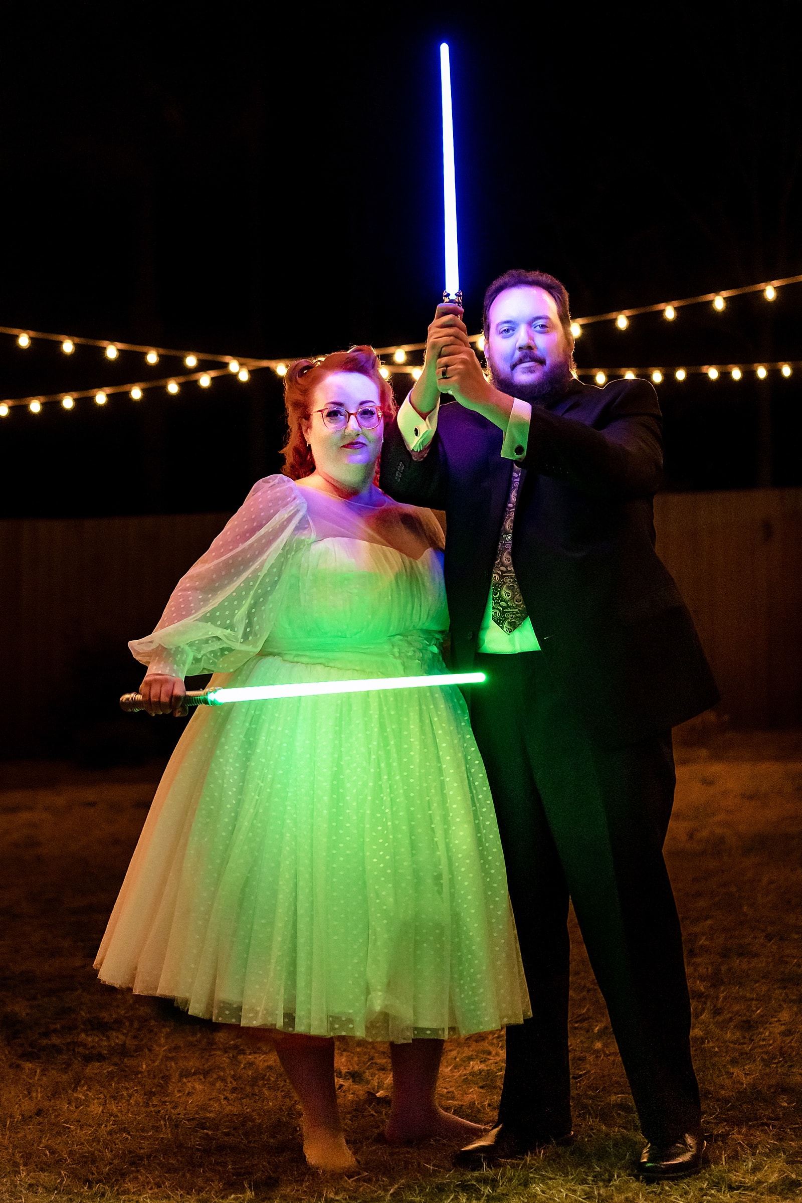 Nerdy wedding with light saber and rainbow details