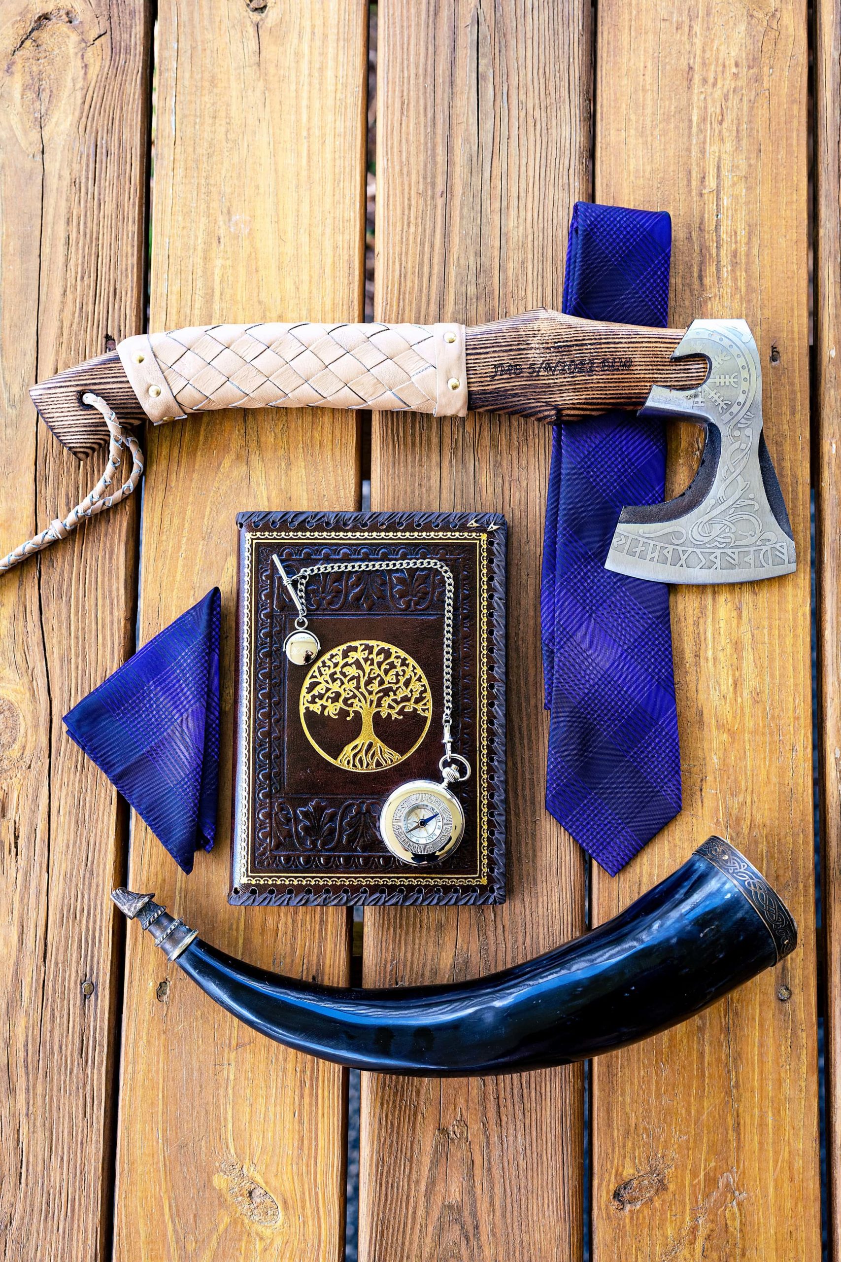 This groom gave his groomsmen axes and viking drinking horns!