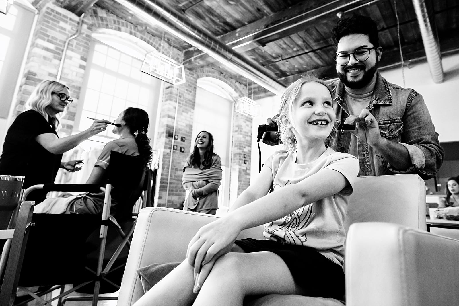 flower girl gets her hair done at the Cotton Room, downtown Durham wedding | images by Kivus & Camera