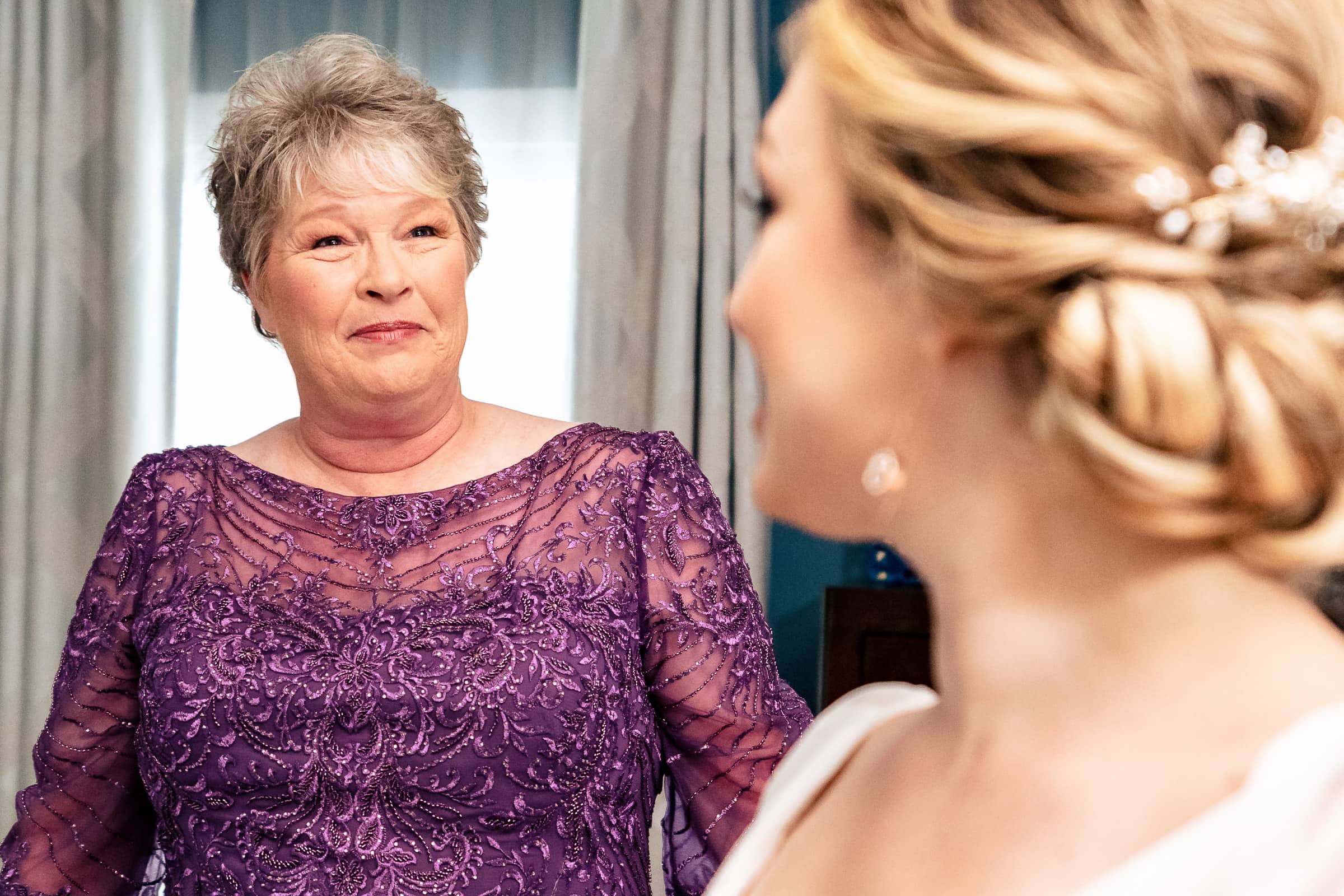 mother of the bride looks lovingly at her daughter | photos by Kivus & Camera