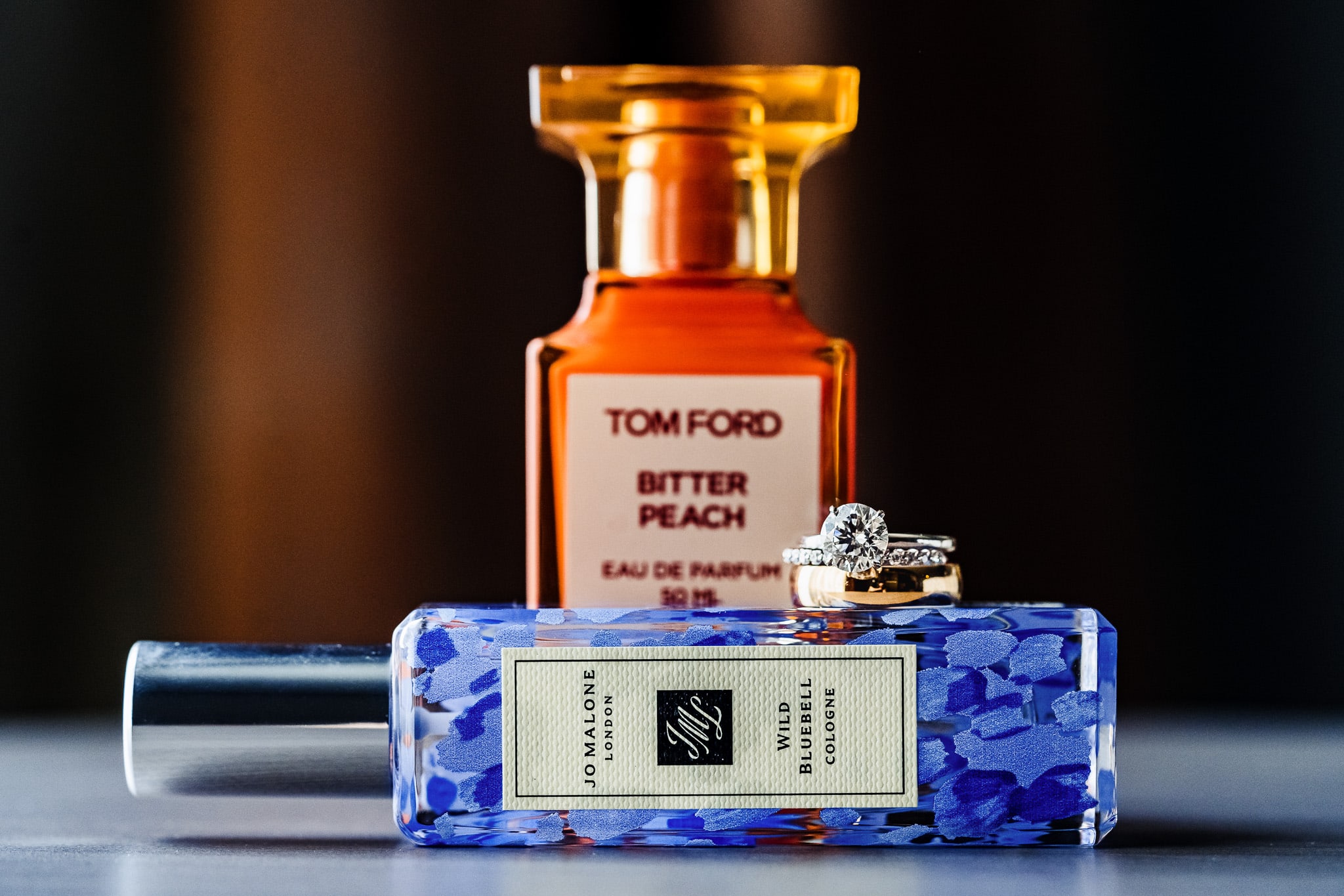 perfume and cologne with wedding rings | photo by Kivus & Camera