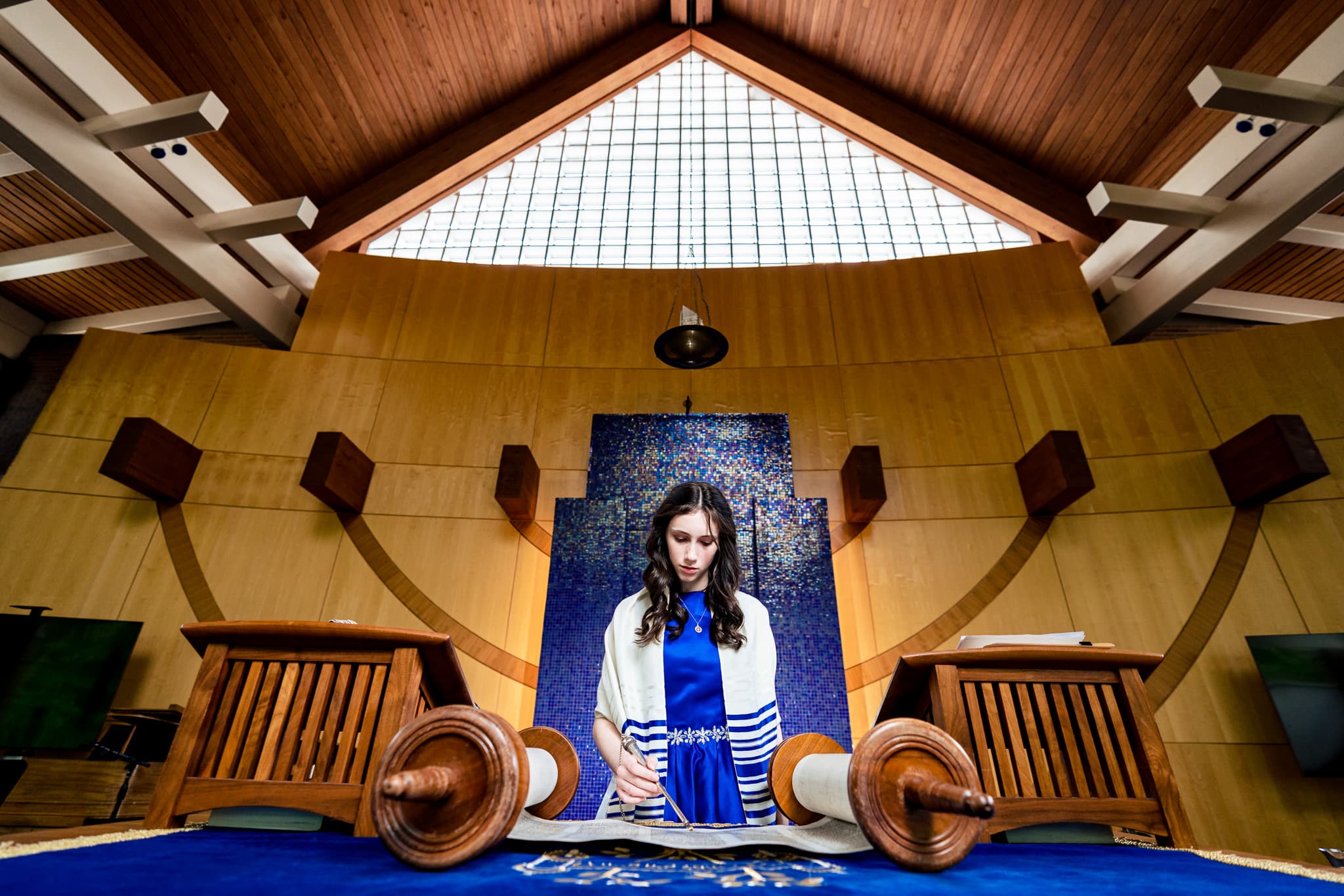 young woman reads from the Torah at her bat mitzvah in north carolina | from mitzvah photographer Kivus & Camera