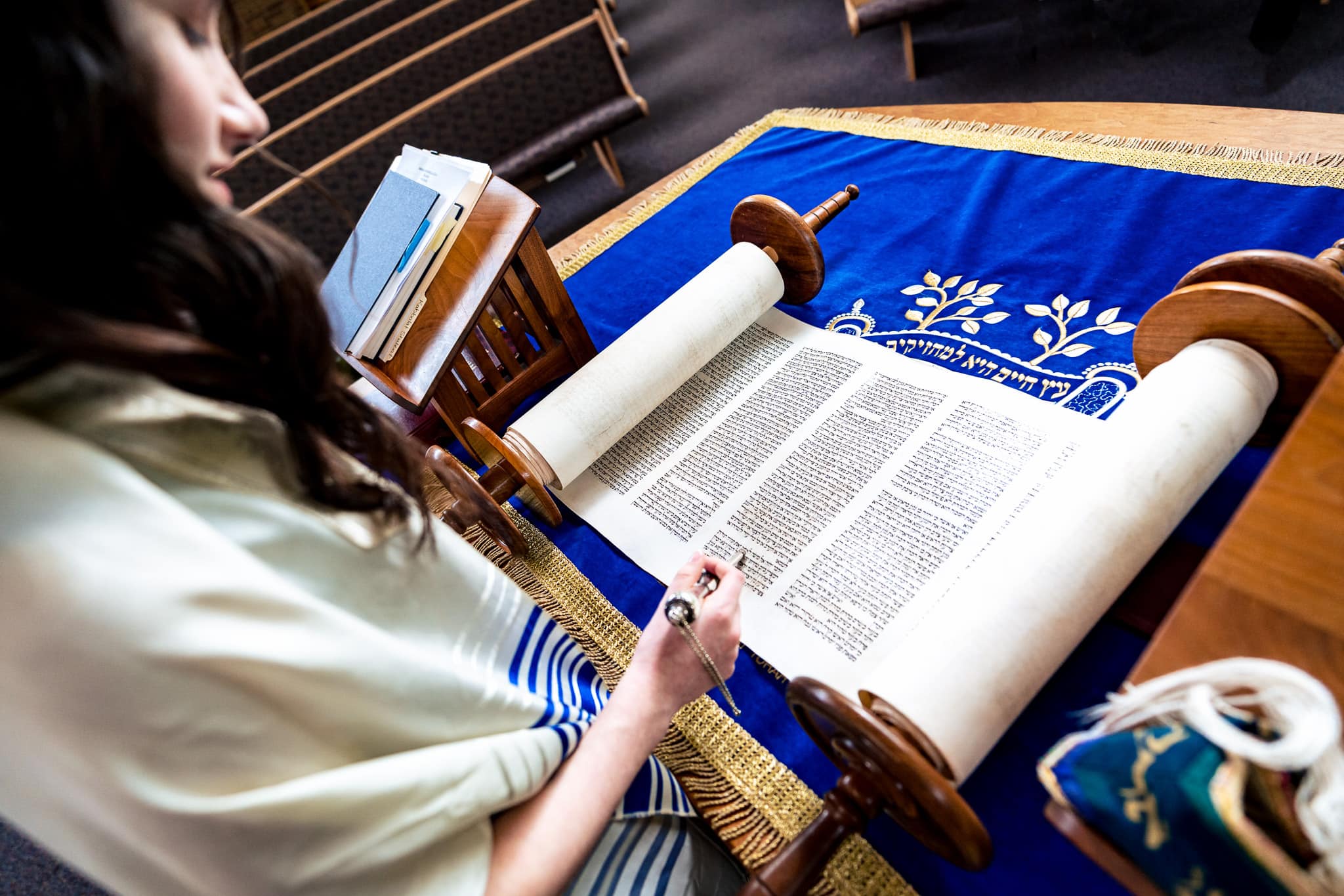 young woman reads from the Torah at her bat mitzvah in north carolina | from mitzvah photographer Kivus & Camera