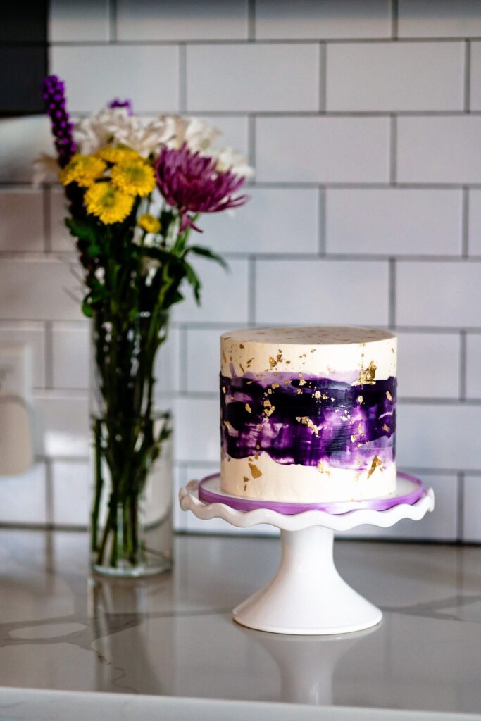 purple and gold wedding dessert cake for an intimate wedding | photo by Kivus & Camera