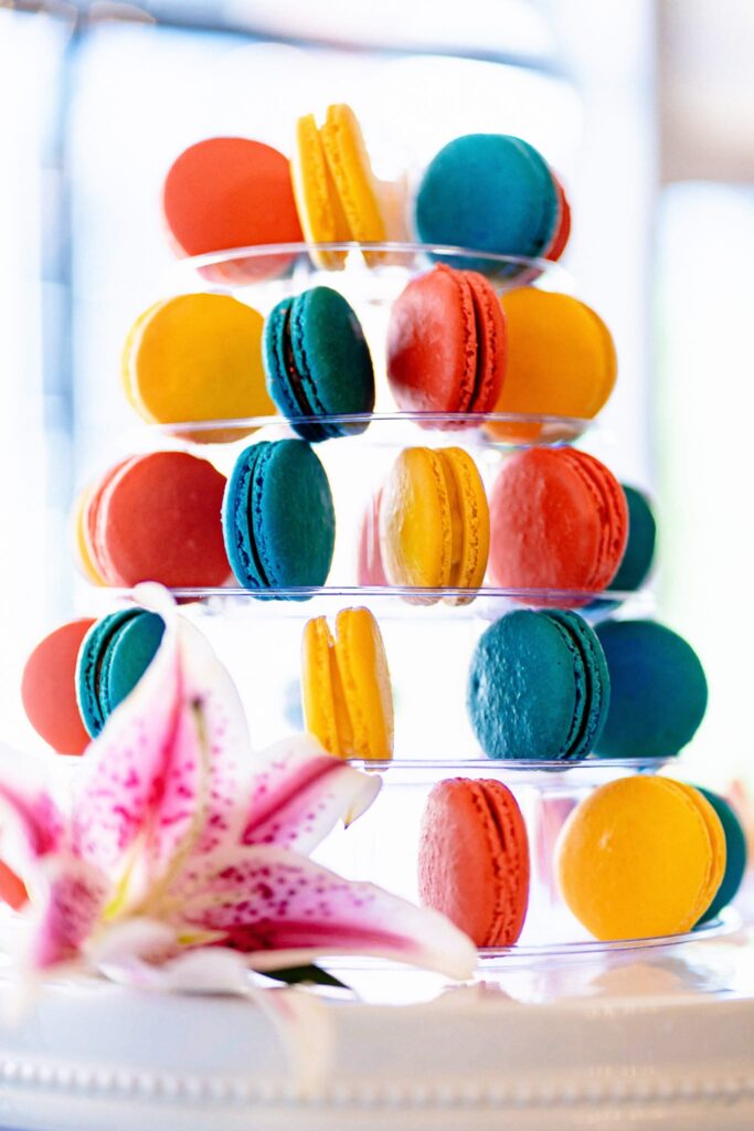 colorful macarons on display at a wedding | photo by Kivus and Camera