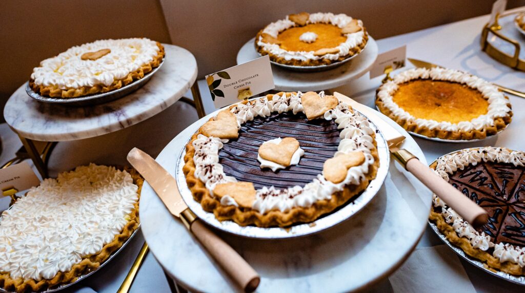 display of pies as wedding desserts in Raleigh, NC | photo by Kivus & Camera